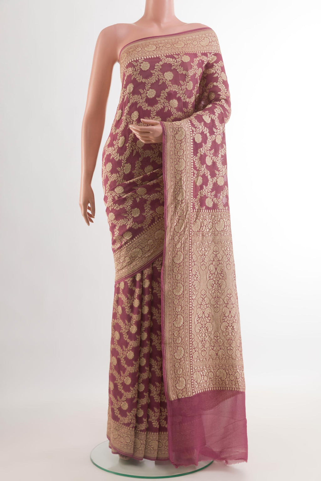 Lavender Banarasi Georgette Saree with Zari Brocade on the body and Zari Border.  displayed on a mannequin