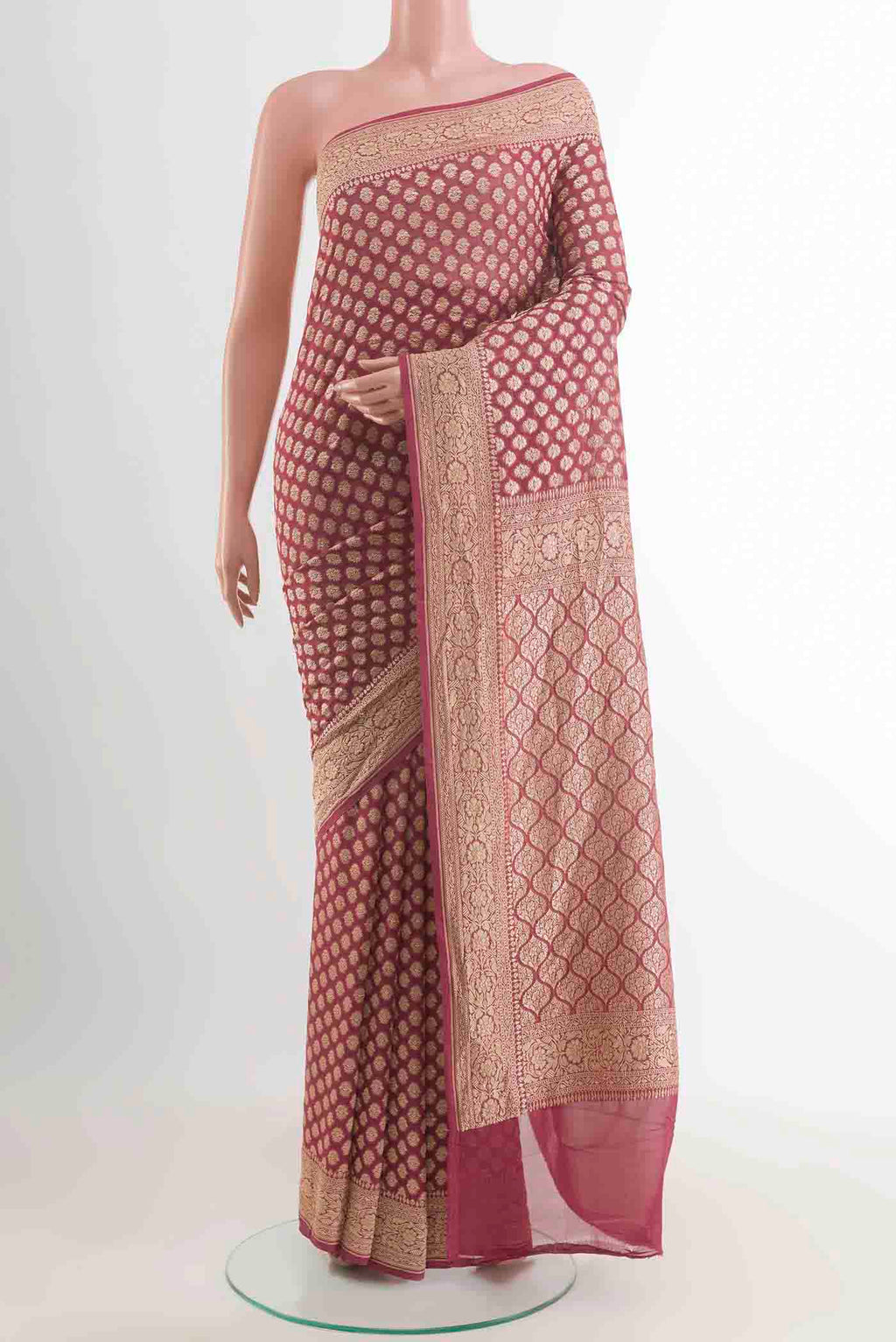 Mauve Banarasi Georgette Saree with Zari Butta on the body and Zari Border displayed on a mannequin