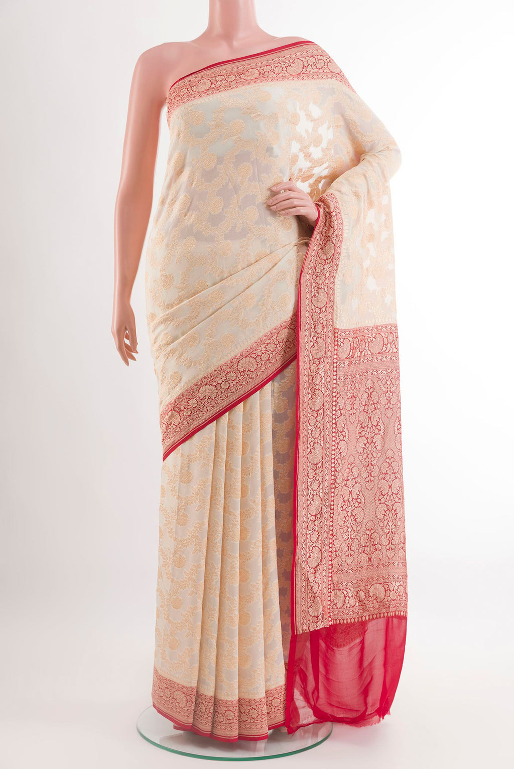 Off White Banarasi Georgette Saree with Zari Brocade on the body and Zari Border.  displayed on a mannequin