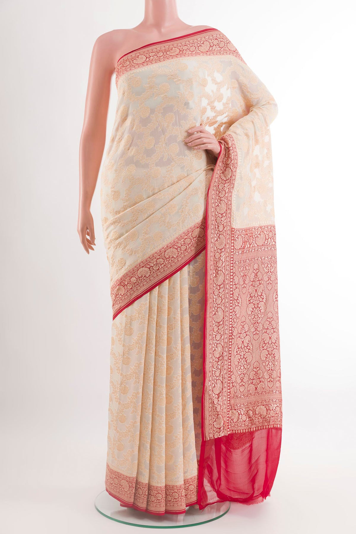Off White Banarasi Georgette Saree with Zari Brocade on the body and Zari Border.  displayed on a mannequin