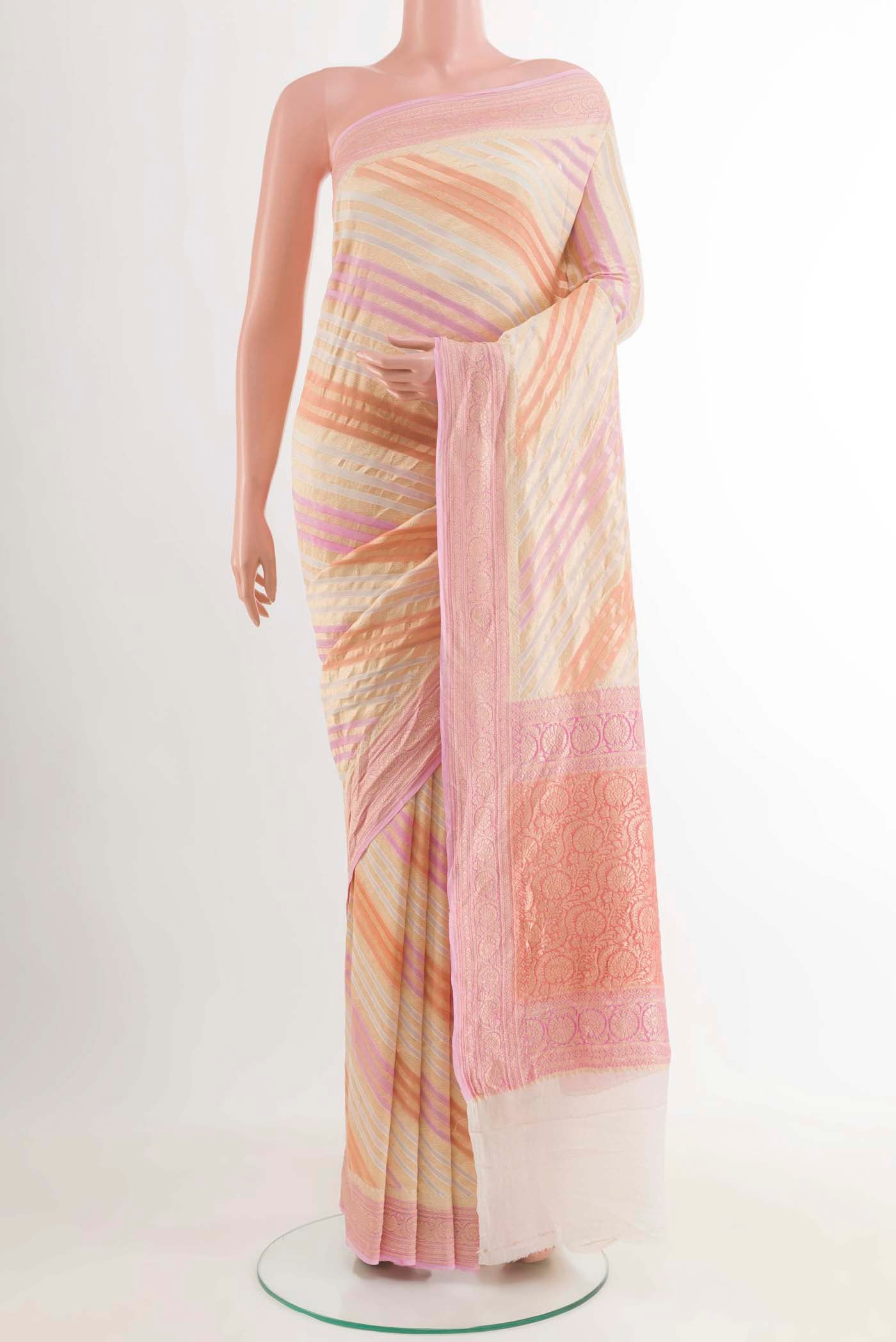 Multi Color Banarasi Georgette Saree with Stripes on the body and Zari Border displayed on a mannequin