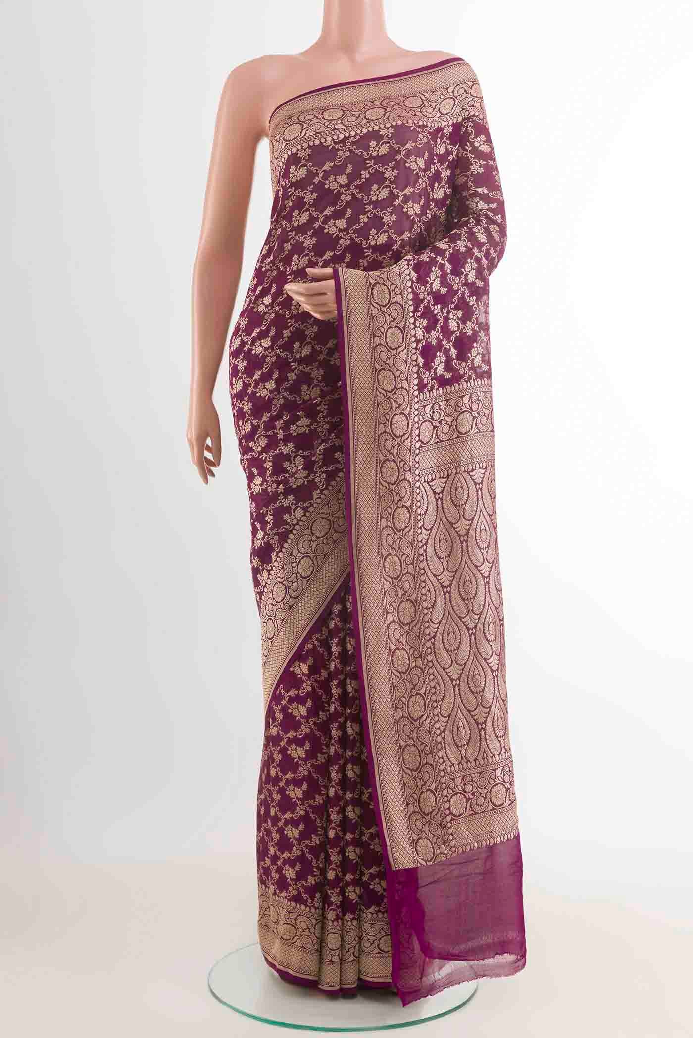 Purple Banarasi Georgette Saree with Zari Brocade on the body and Zari Border displayed on a mannequin