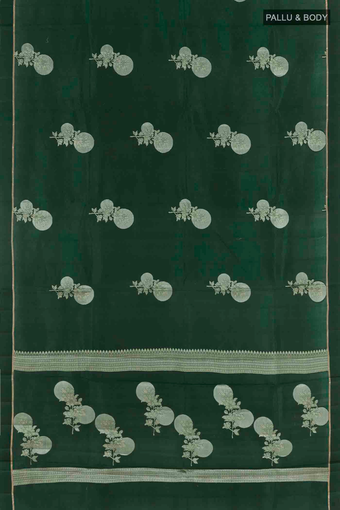 Flat view of Bottle Green Banarasi Raw Silk Saree with Zari Butta on the body and Thin Zari Line