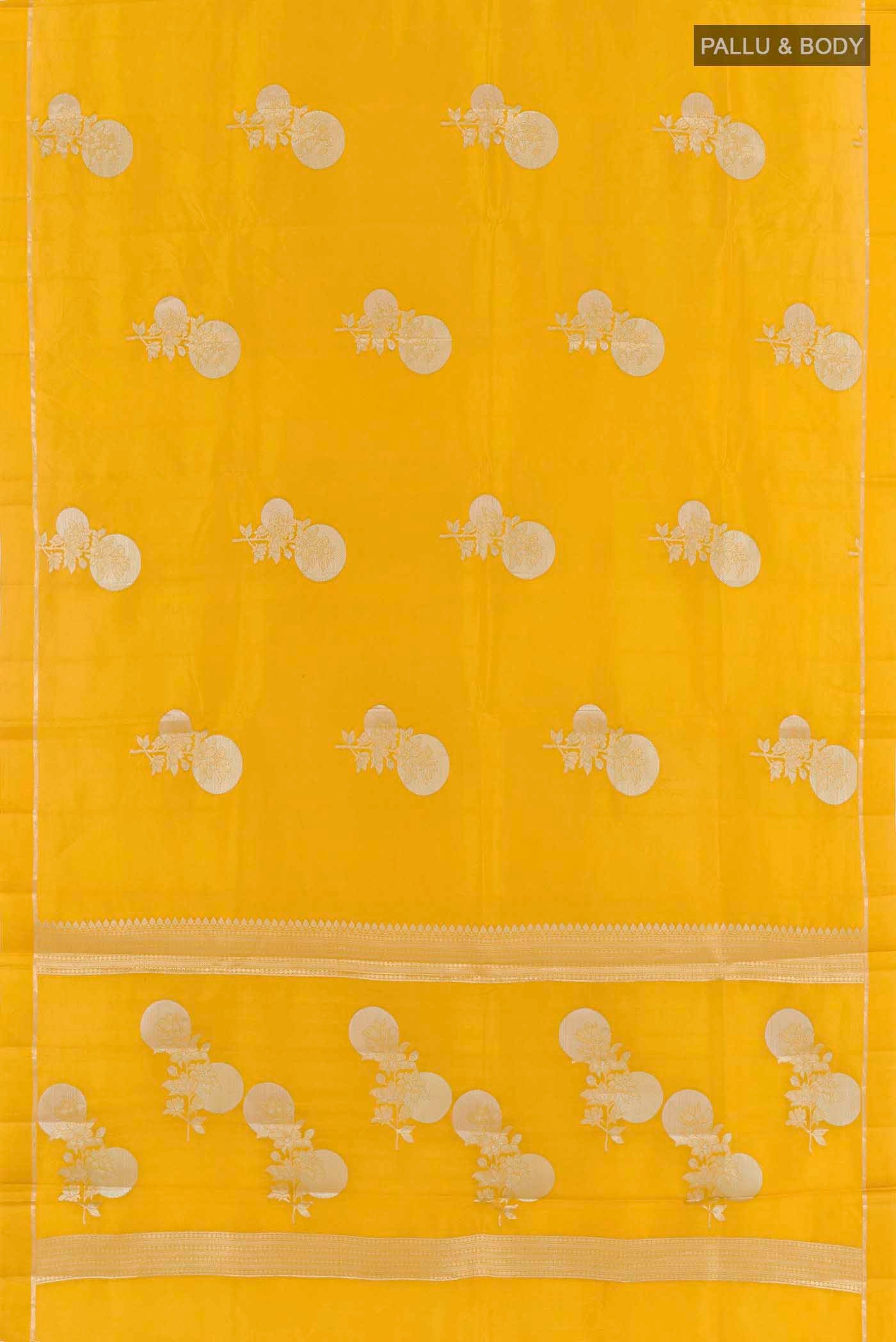 Flat view of Yellow Banarasi Raw Silk Saree with Zari Butta on the body and Zari Border
