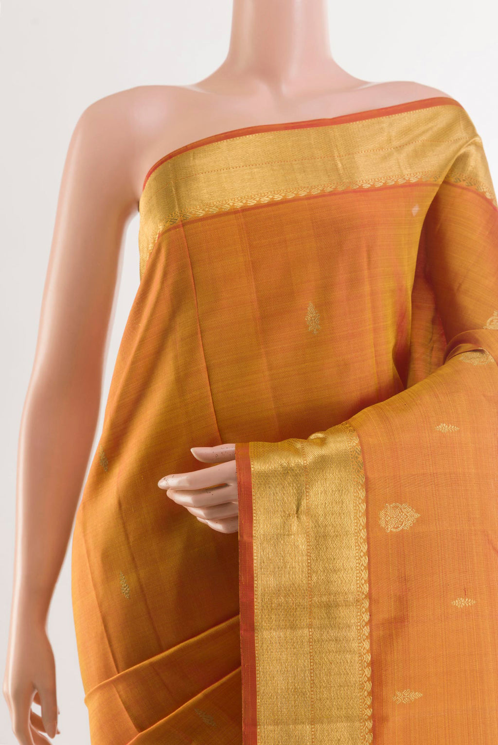 Border image of Peach Kanjivaram Silk Saree with Zari Brocade on the body and Zari Border. 