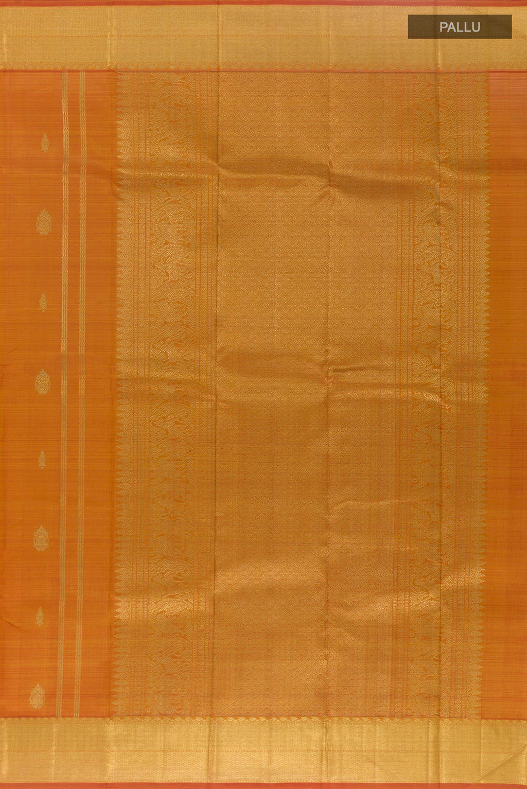 Close up image of the pallu of Peach Kanjivaram Silk Saree with Zari Brocade on the body and Zari Border. 