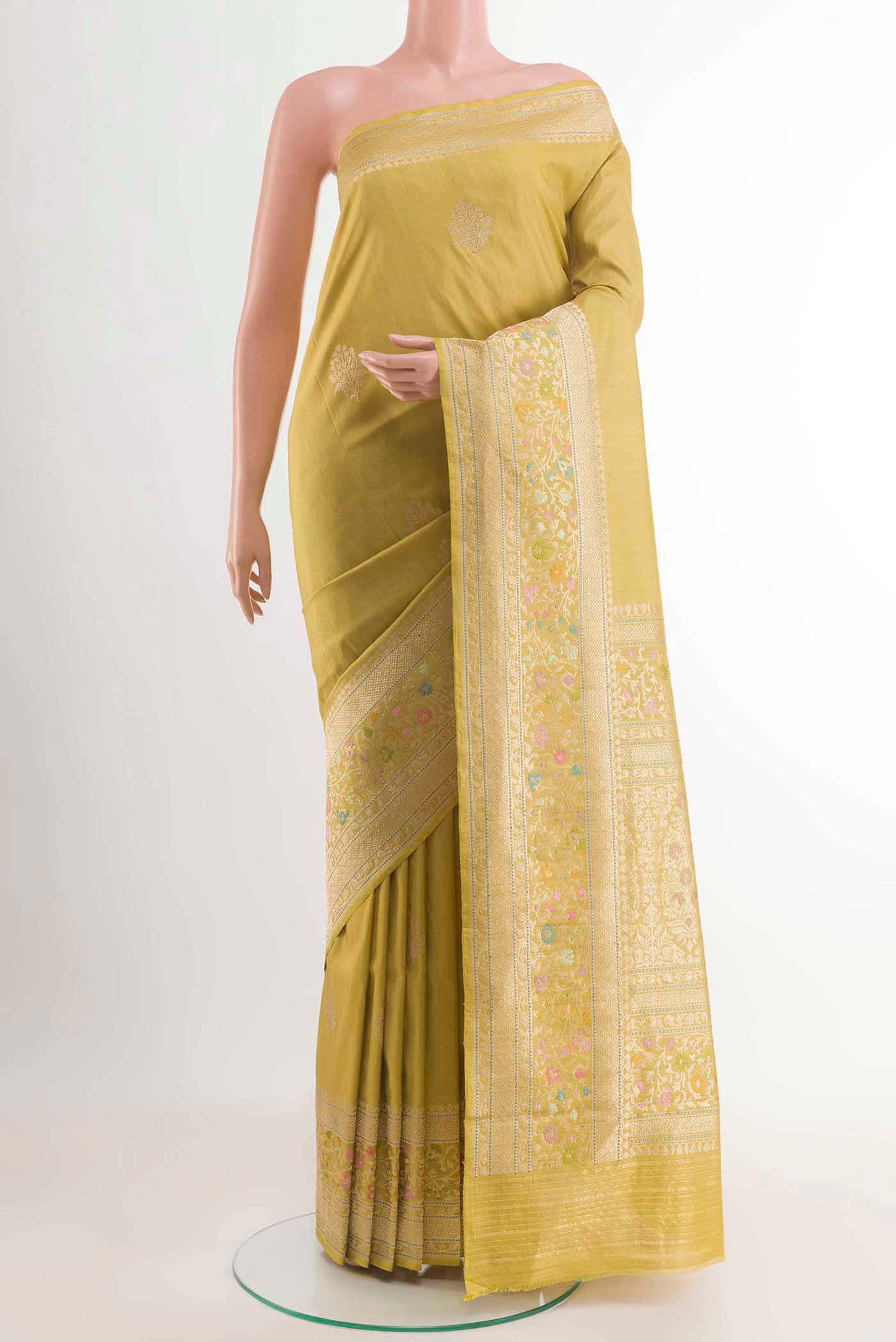 Lemon Yellow Banarasi Silk Saree with Zari Brocade on the body and Zari Border displayed on a mannequin