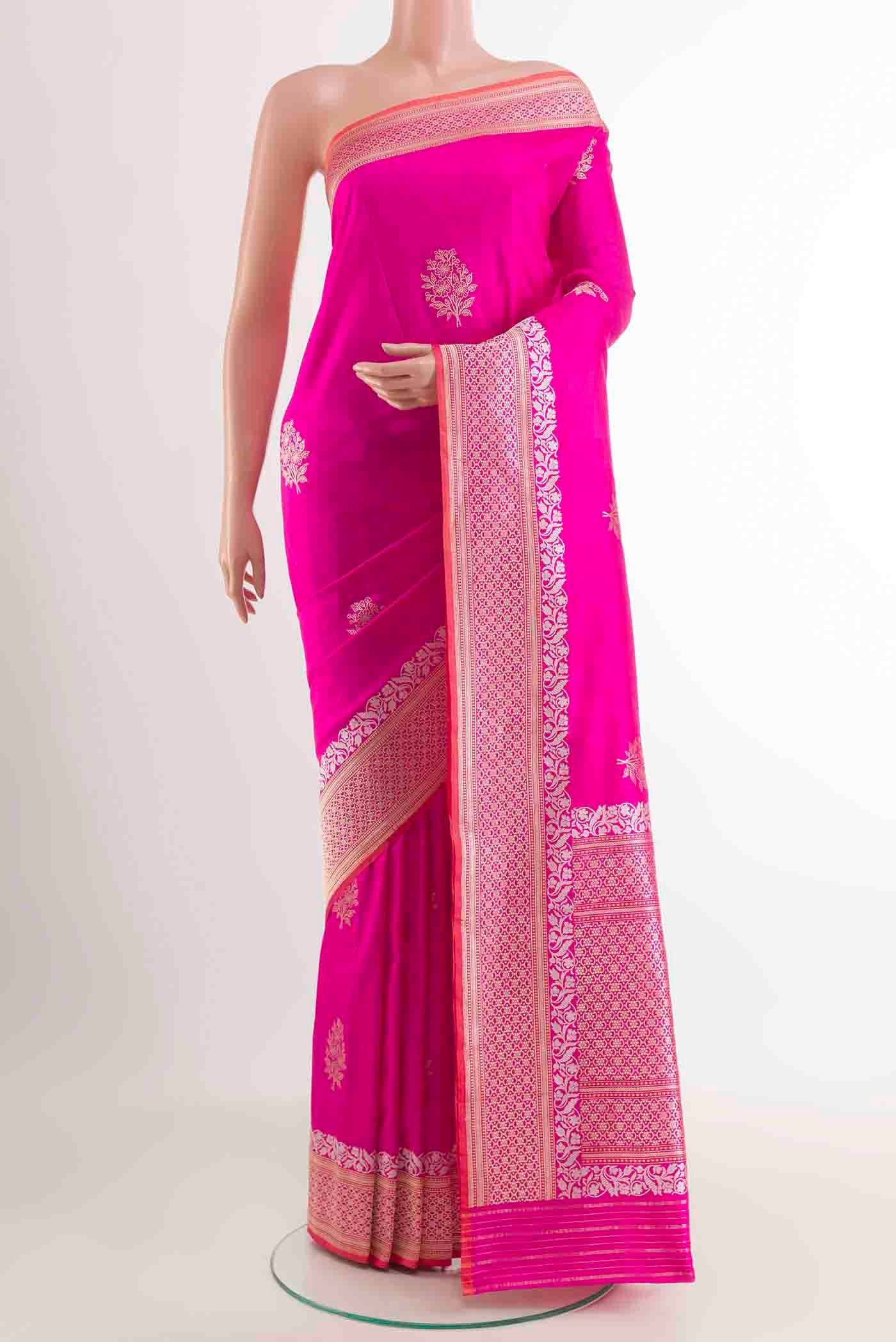 Pink Banarasi Silk Saree with Zari Butta on the body and Zari Border displayed on a mannequin
