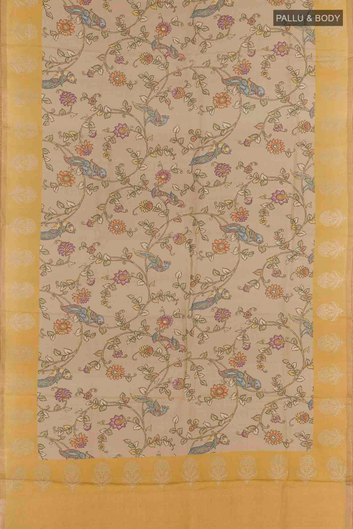 Flat view of Beige Tussar Silk Saree with Printed design on the body and Embroidery Border
