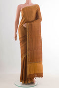 Brown Tussar Silk Saree with Embroidery on the body and Embroidery Border displayed on a mannequin