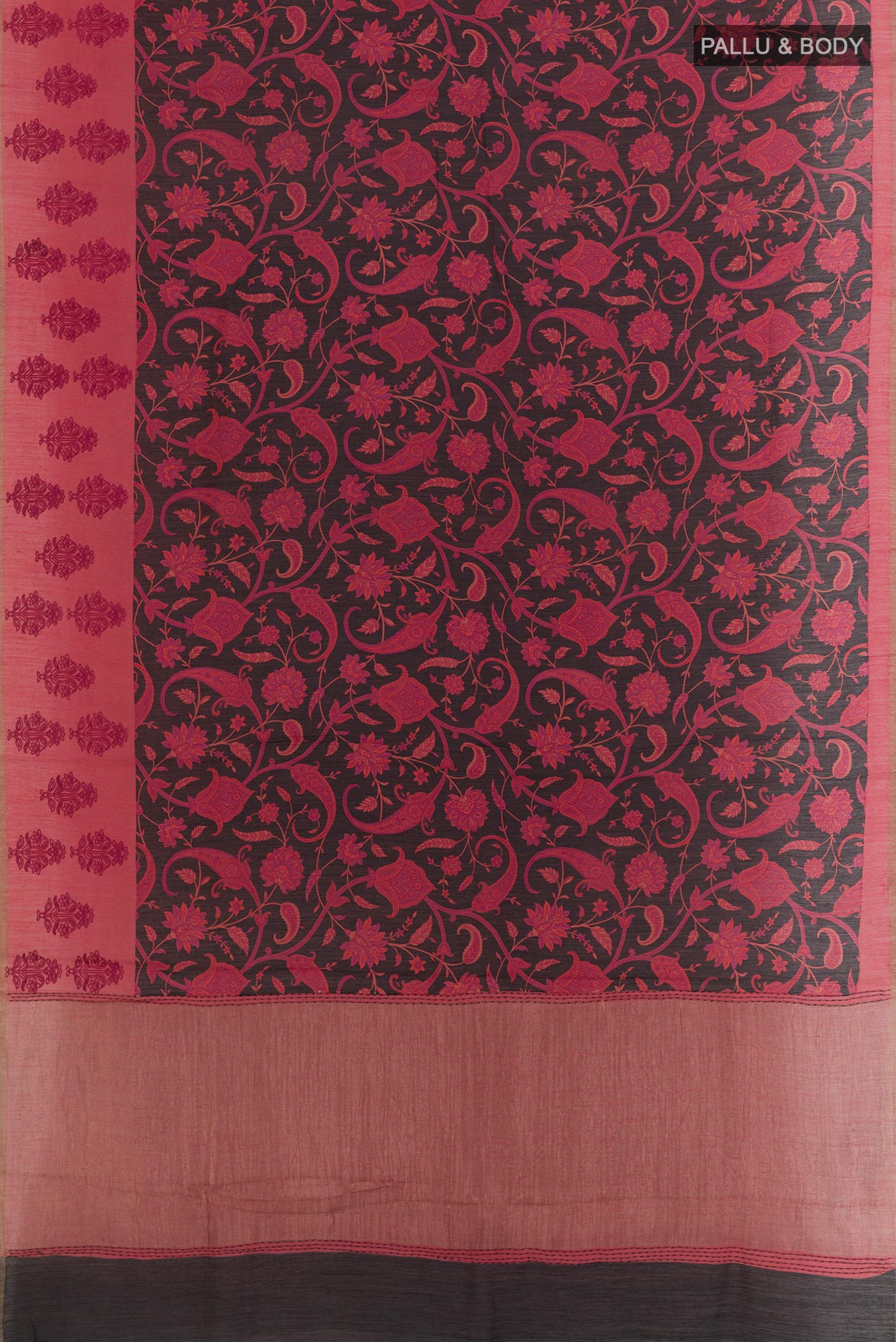 Flat view of Black Tussar Silk Saree with Printed design on the body and Zari Border. 