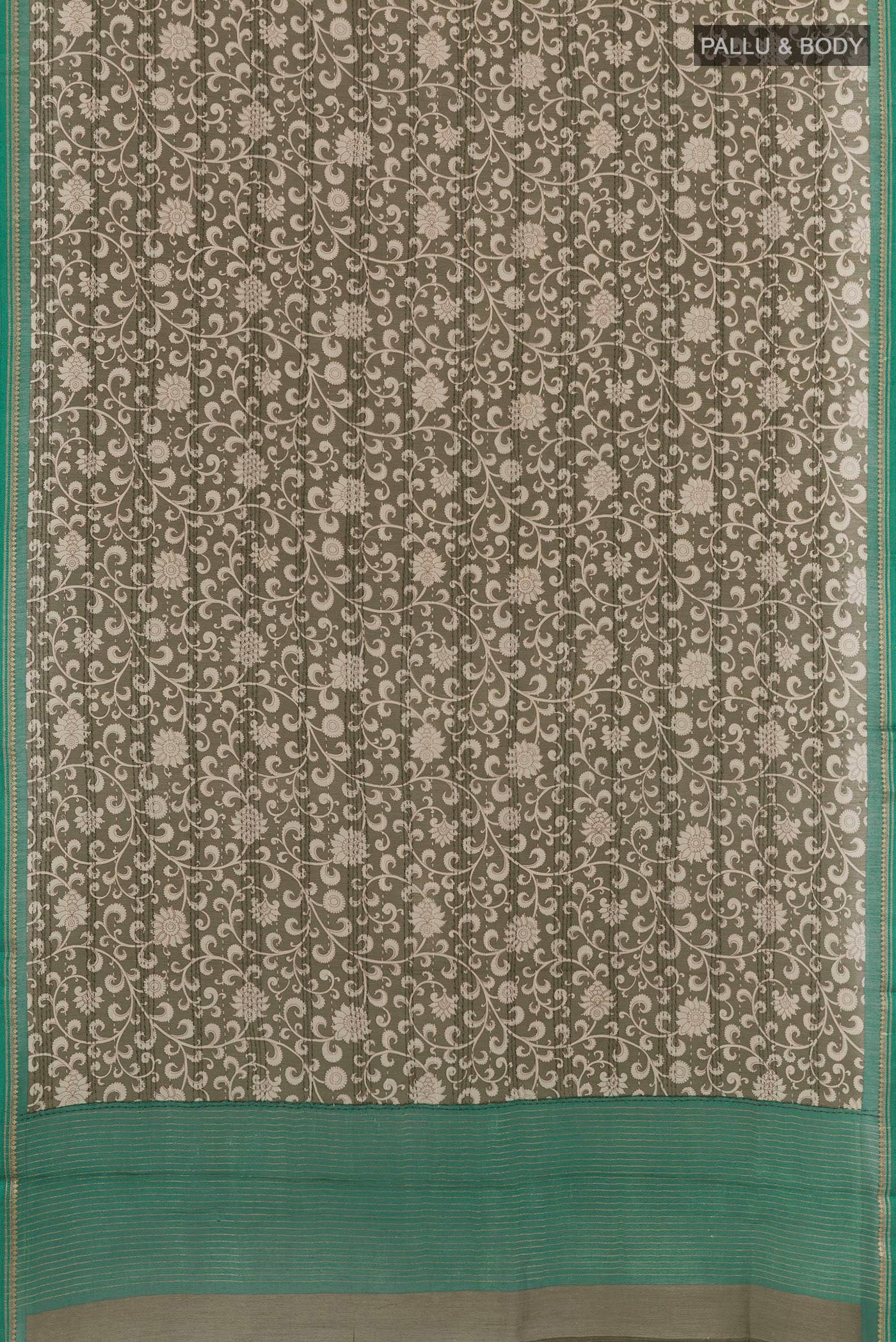 Flat view of Mehandi Green Tussar Saree with Printed design on the body and Zari Border. 