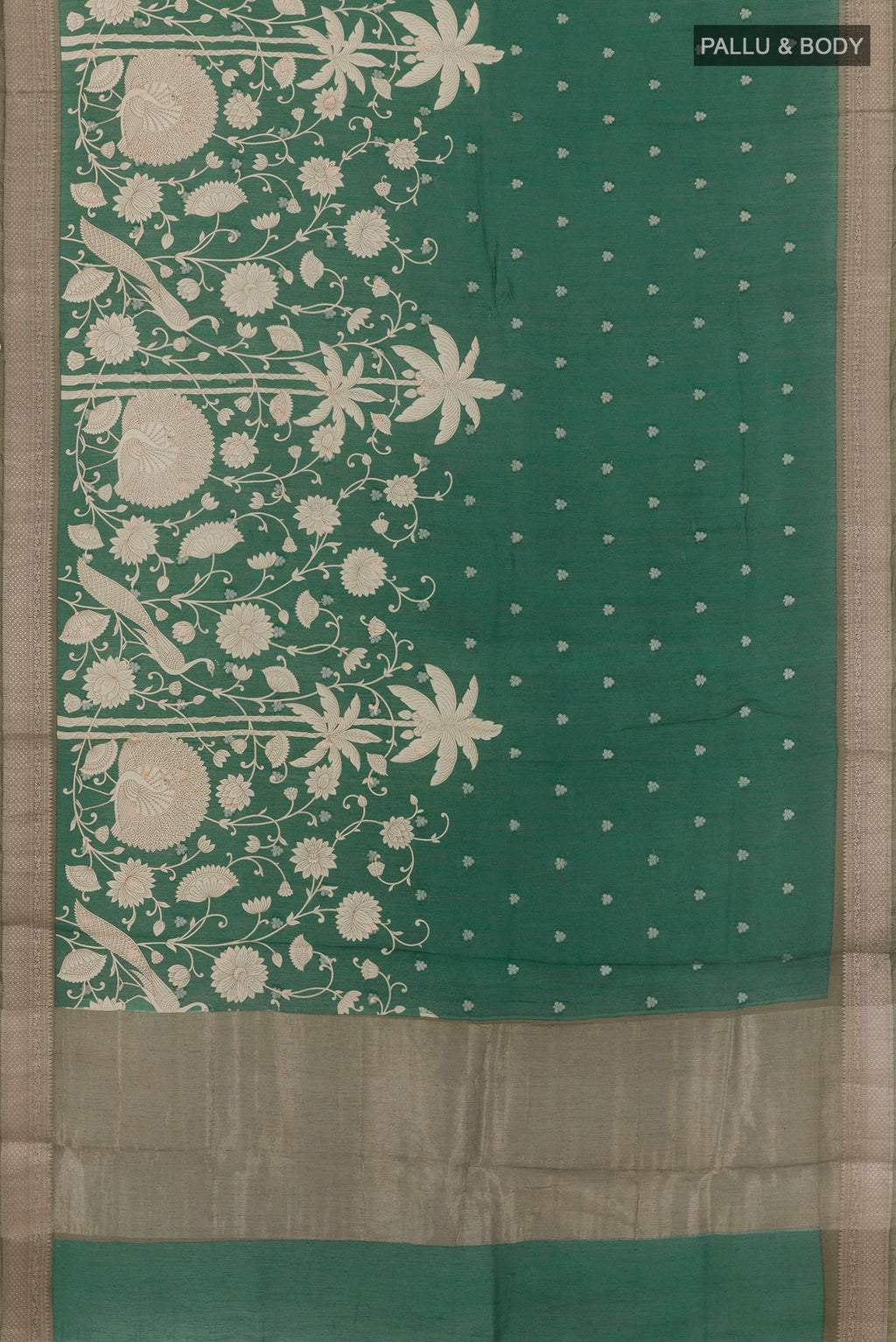 Flat view of Green Tussar Saree with Printed design on the body and Zari Border. 