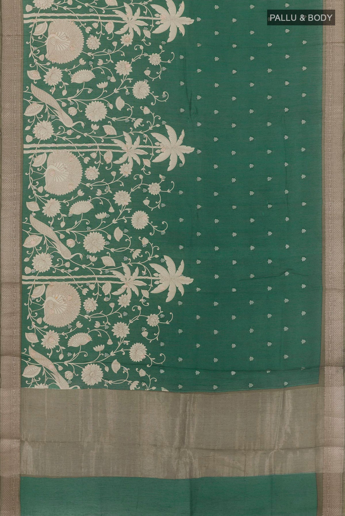 Flat view of Green Tussar Saree with Printed design on the body and Zari Border. 