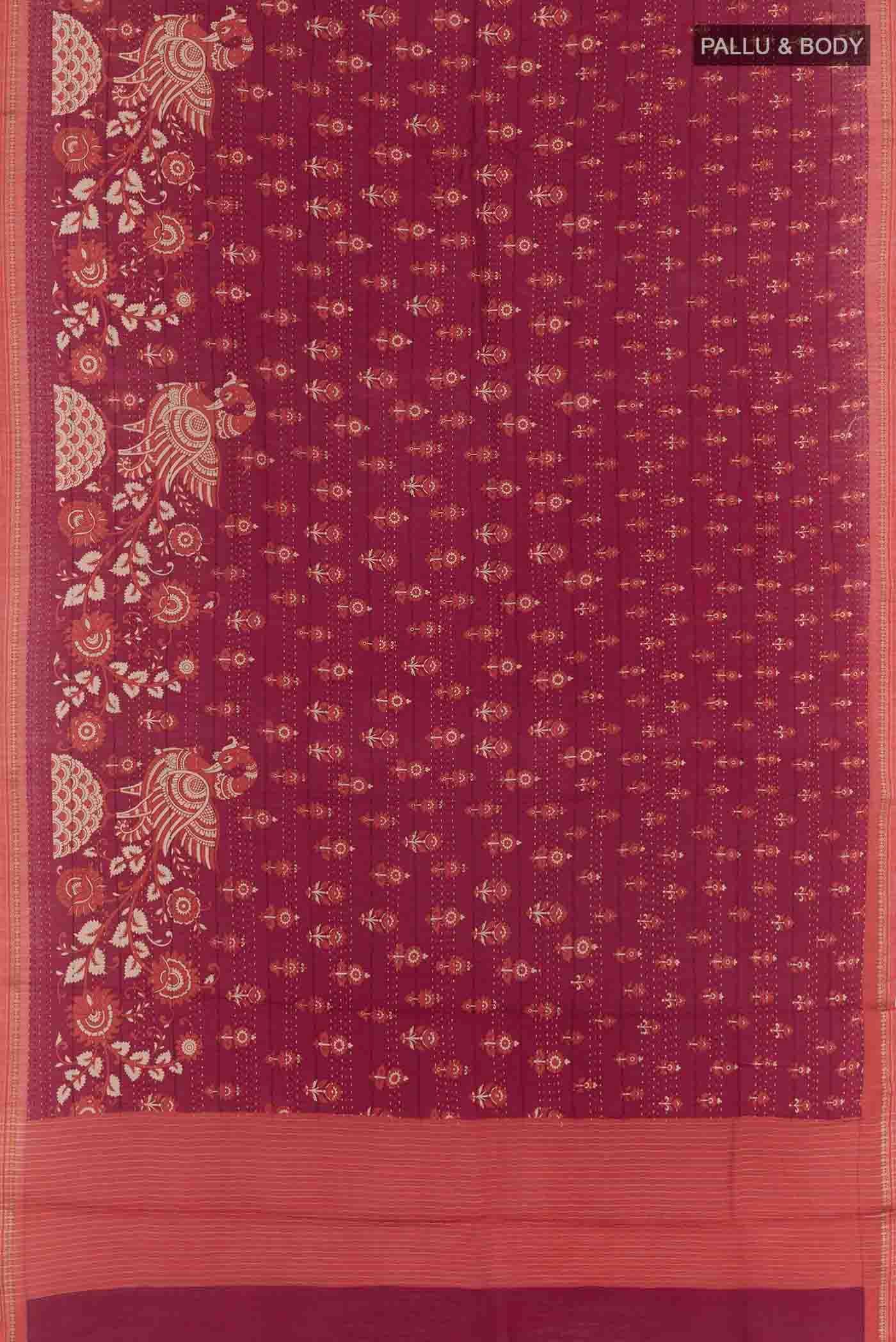 Flat view of Magenta Tussar Silk Saree with Printed design on the body and Zari Border