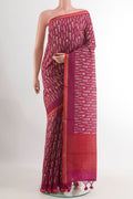 Magenta Tussar Saree with Printed design on the body and Zari Border.  displayed on a mannequin