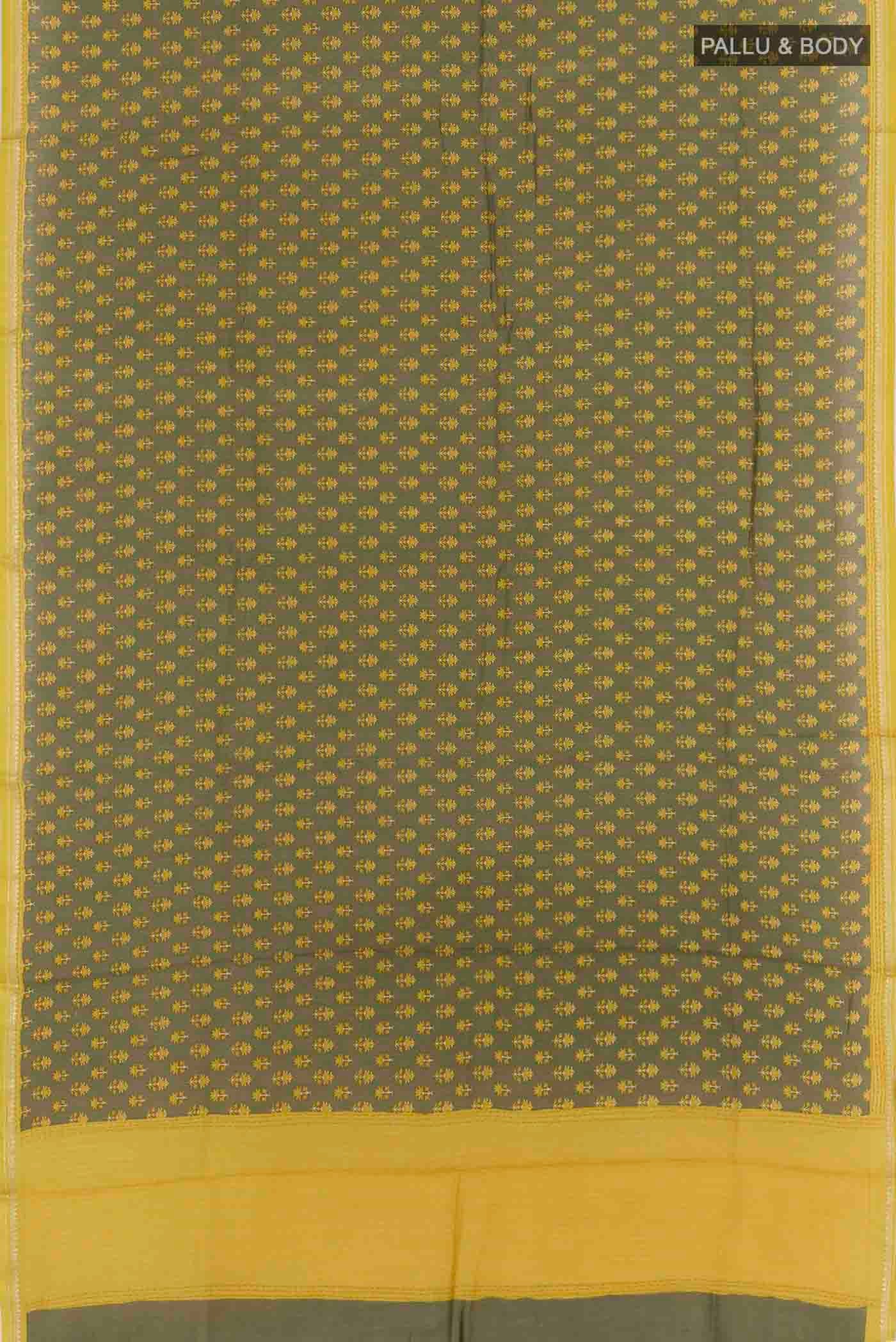 Flat view of Sage Green Tussar Silk Saree with Printed design on the body and Zari Border