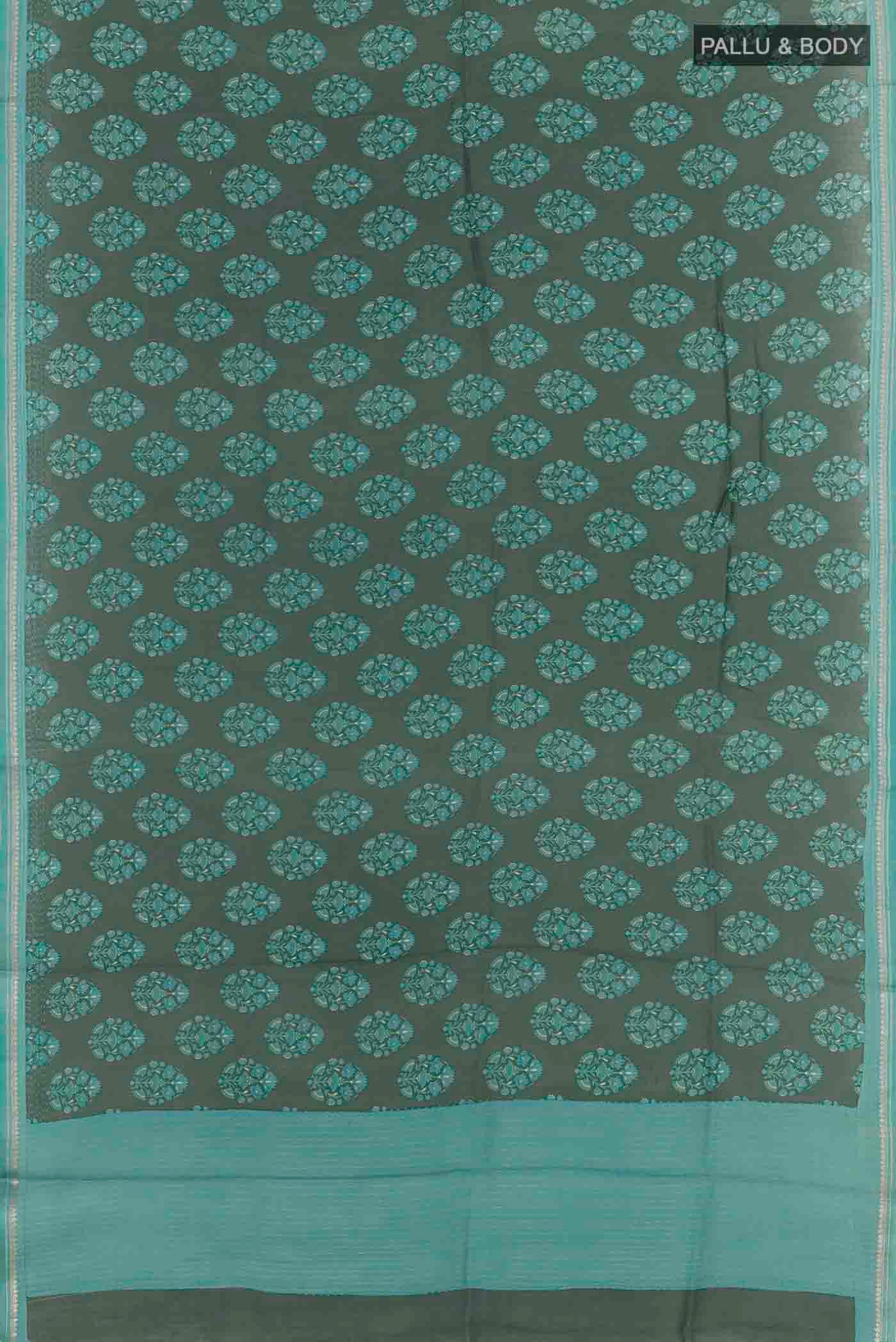 Flat view of Green Tussar Silk Saree with Floral Print on the body and Zari Border