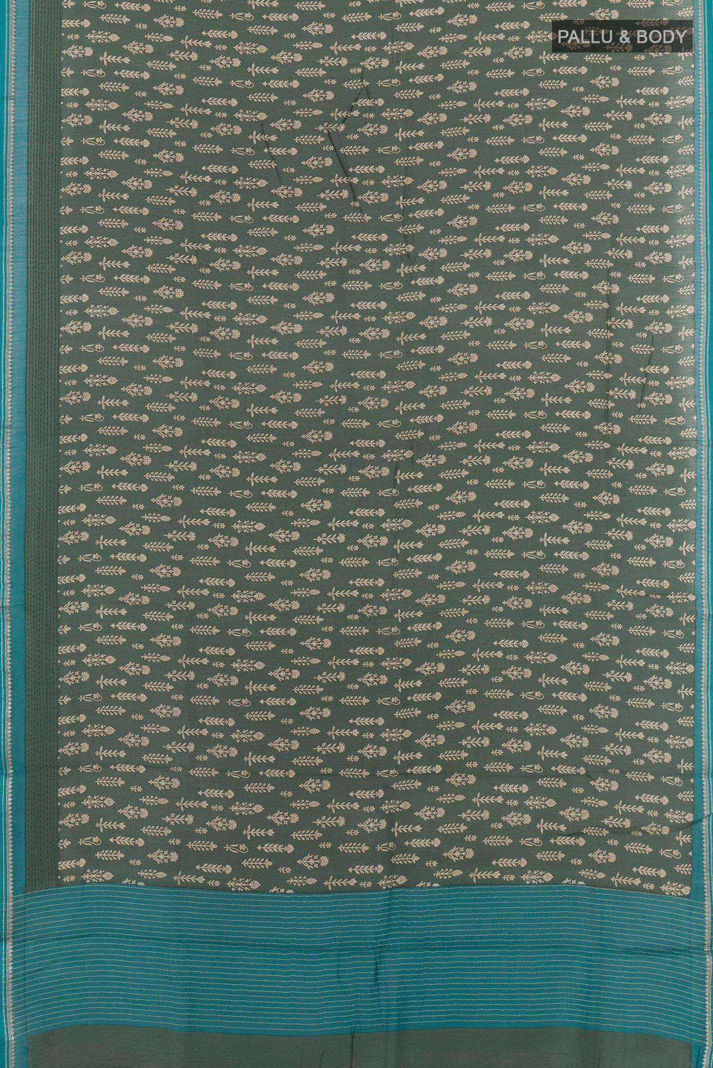 Flat view of Green Tussar Saree with Printed design on the body and Thread Embroidery Border. 
