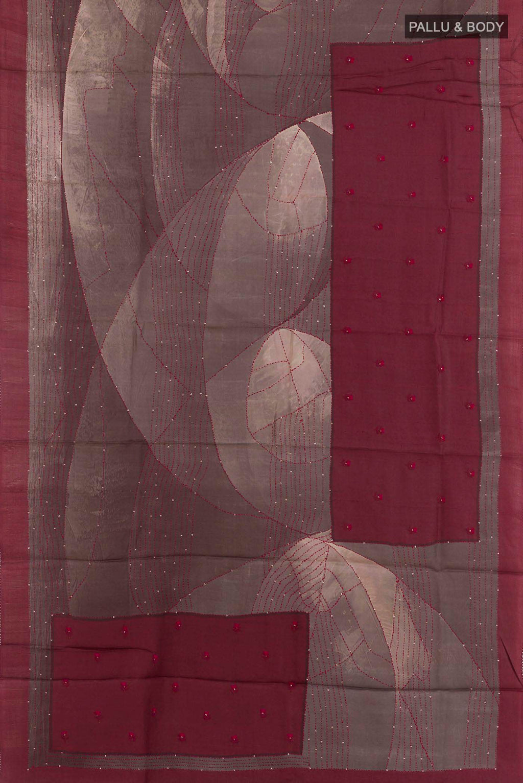 Flat view of Grey Tussar Saree with Printed design on the body and Zari Border. 