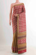Red Tussar Saree with Printed design on the body and Printed Border.  displayed on a mannequin