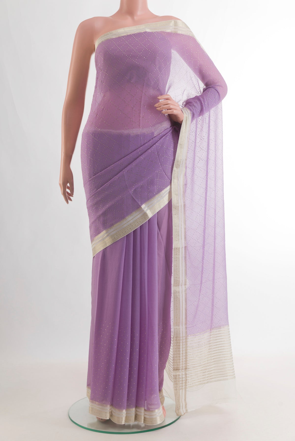 Lavender Mysore Chiffon Saree with Embroidery on the body and Zari Border.  displayed on a mannequin