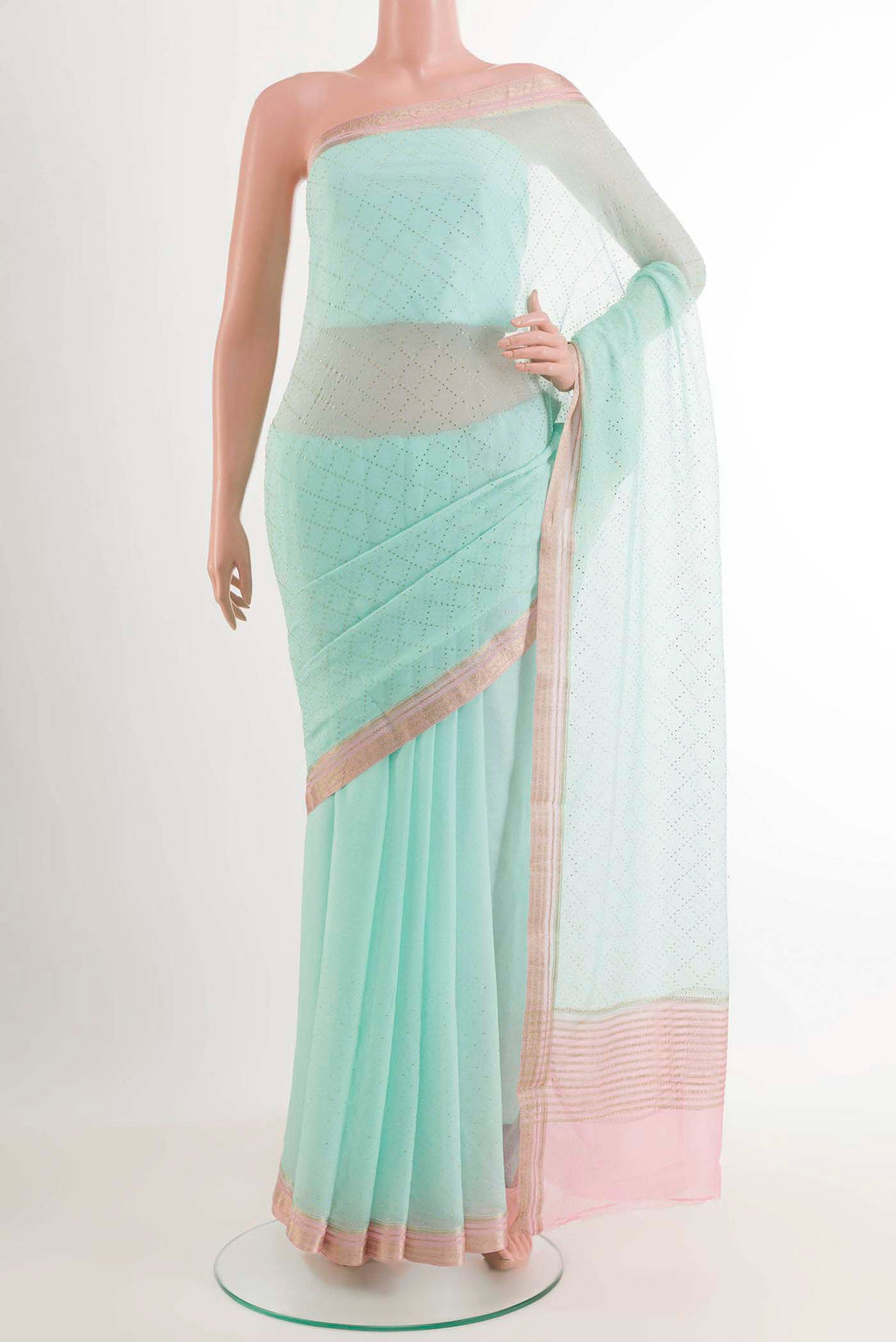 Blue Mysore Chiffon Saree with Embroidery on the body and Zari Border displayed on a mannequin