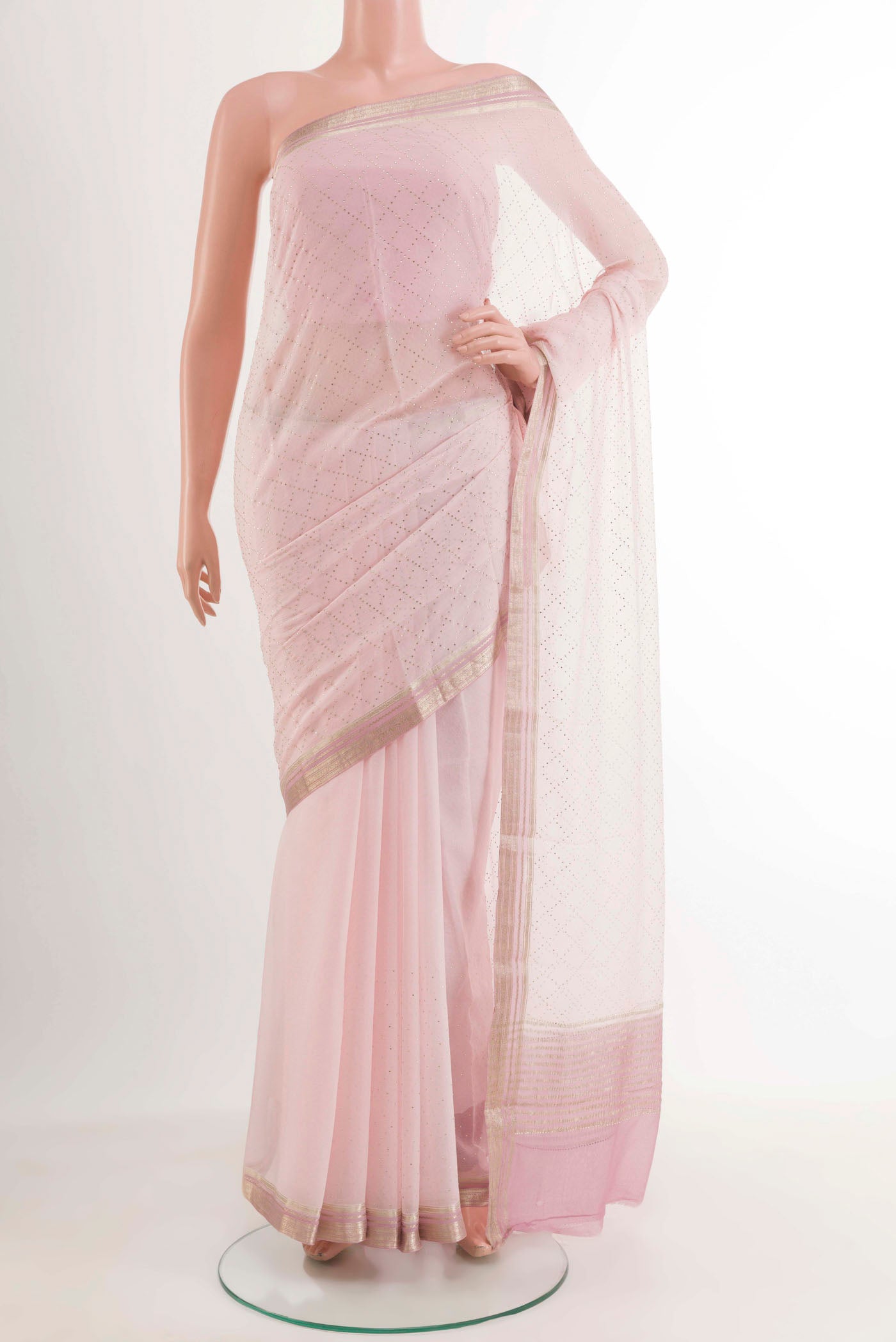 Pink Mysore Chiffon Saree with Embroidery on the body and Zari Border.  displayed on a mannequin