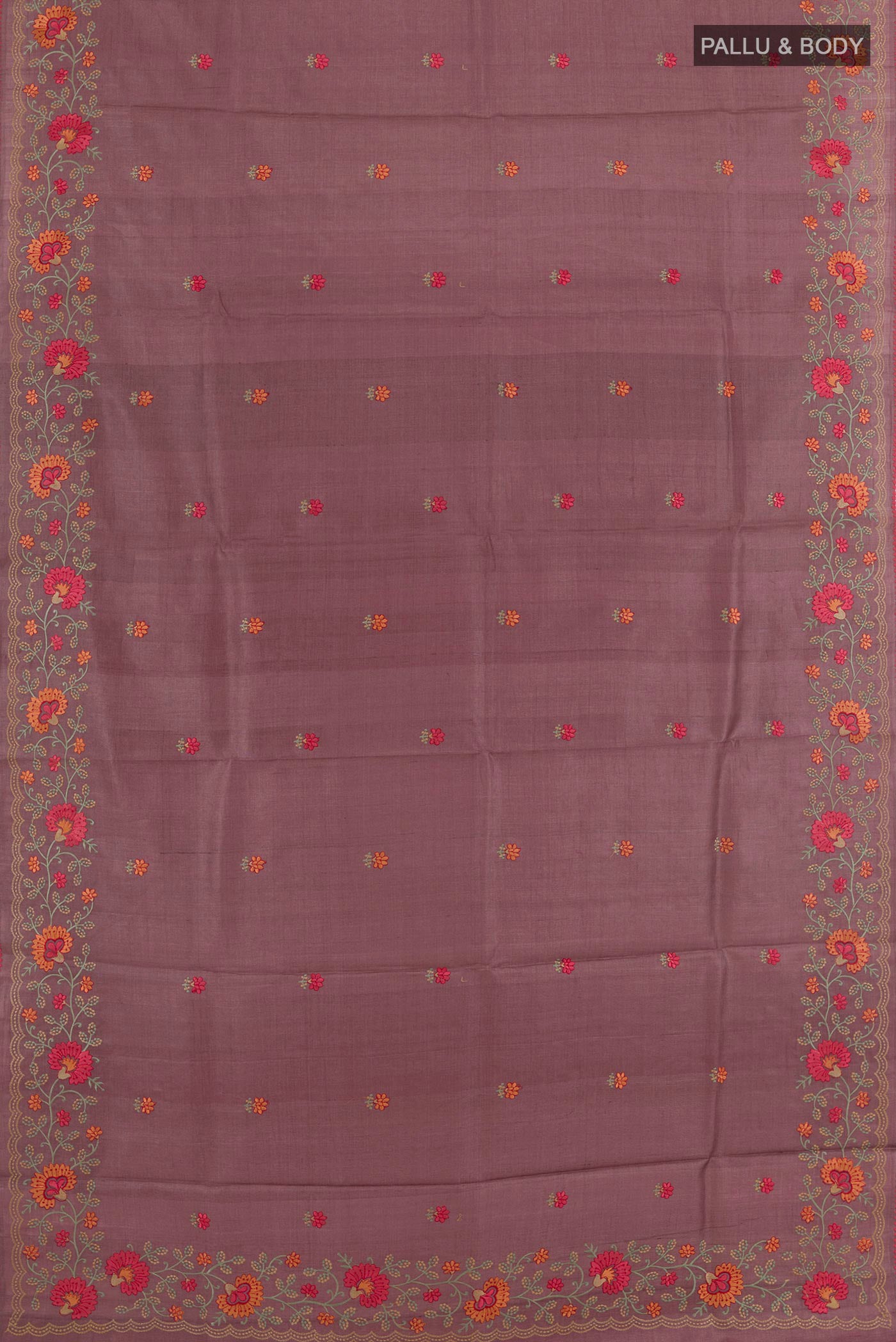 Flat view of Light Magenta Tussar Saree with Thread Butta on the body and Embroidery Border. 