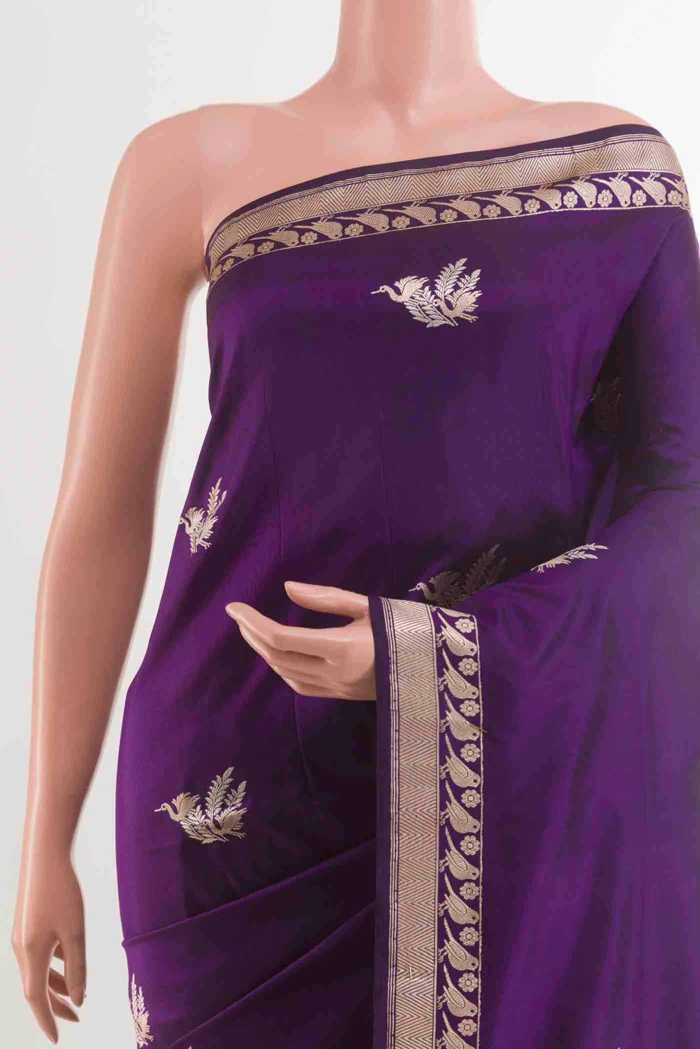 Border image of Purple Banarasi Silk Saree with Zari Butta on the body and Zari Border. 