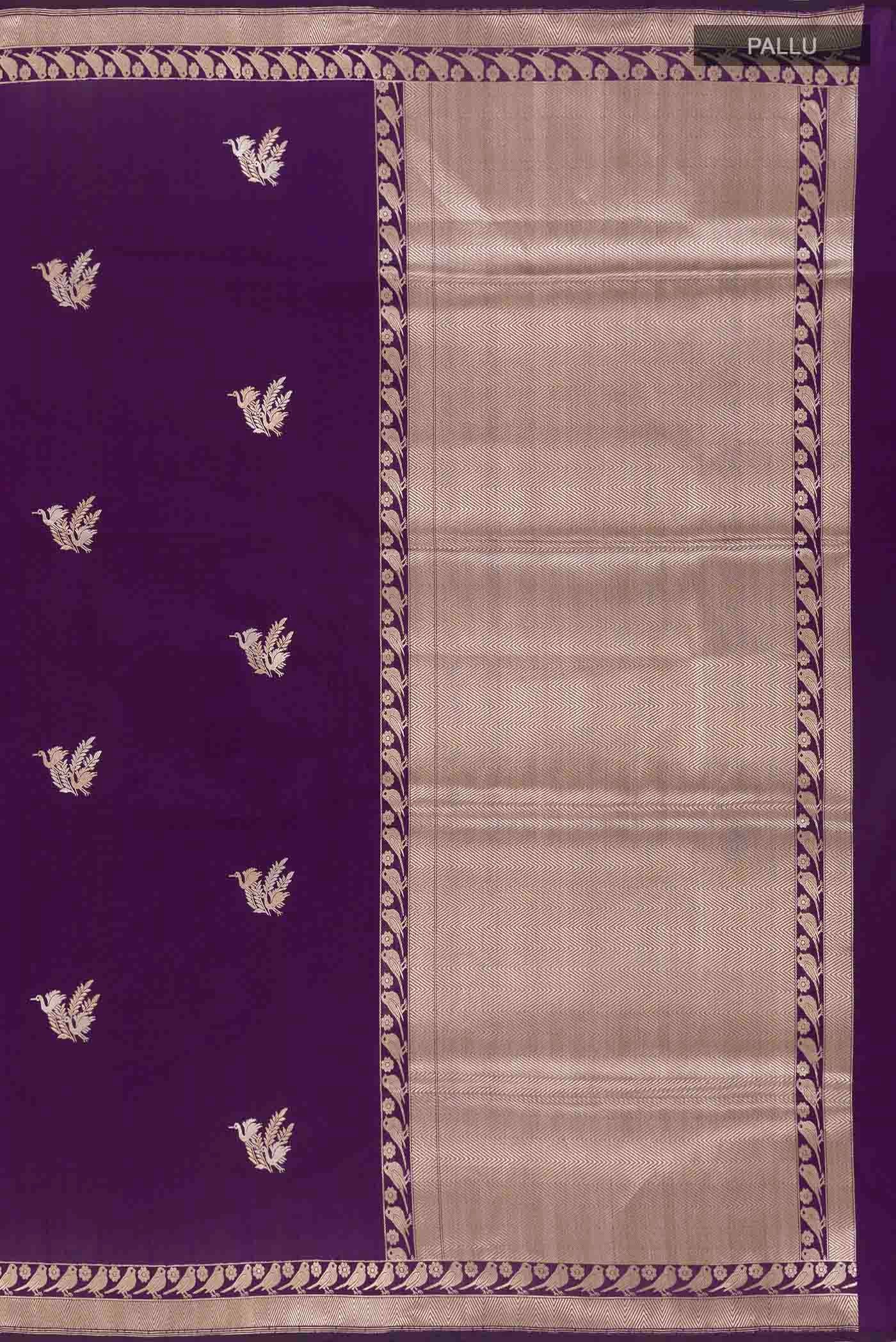 Close up image of the pallu of Purple Banarasi Silk Saree with Zari Butta on the body and Zari Border. 
