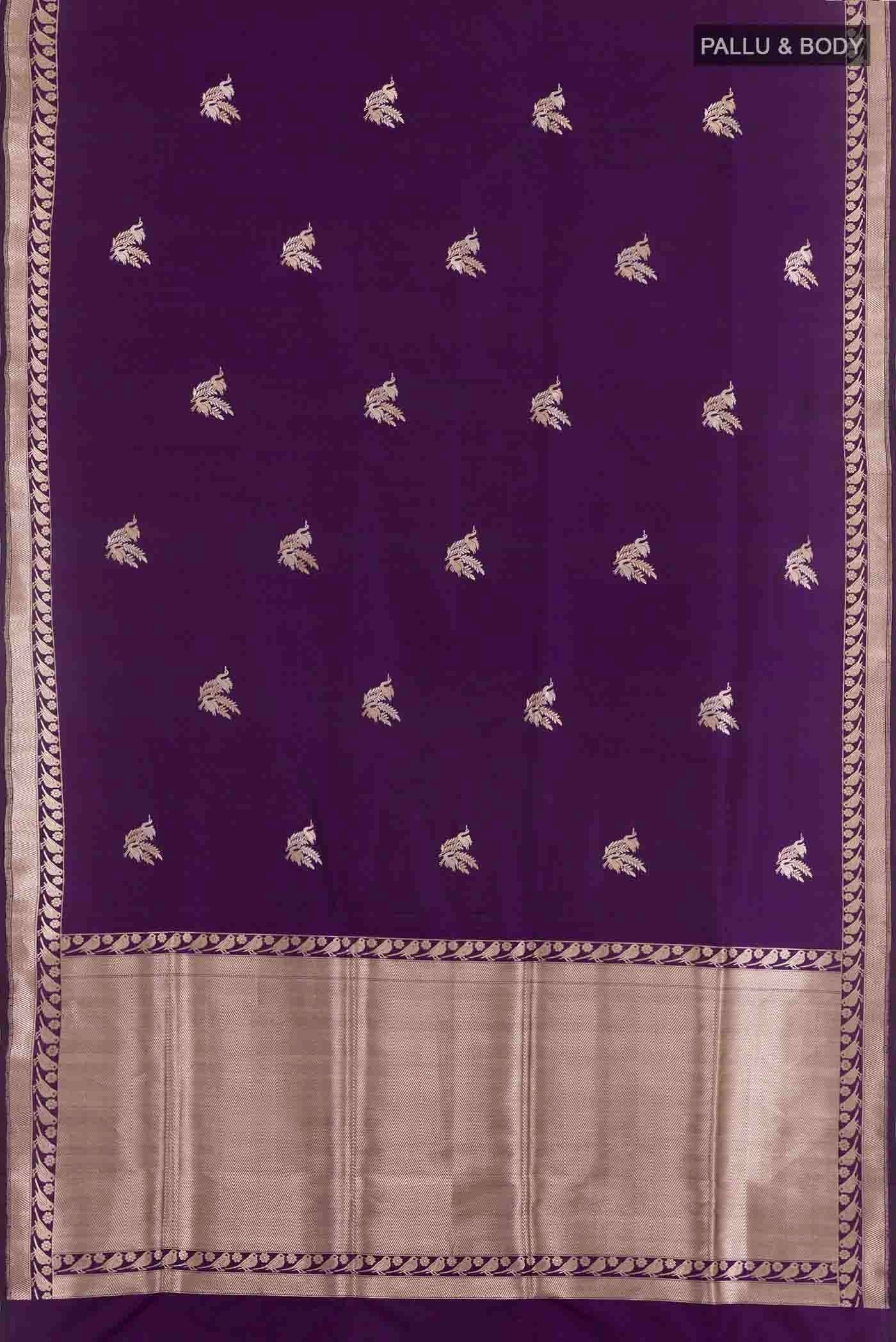 Flat view of Purple Banarasi Silk Saree with Zari Butta on the body and Zari Border. 