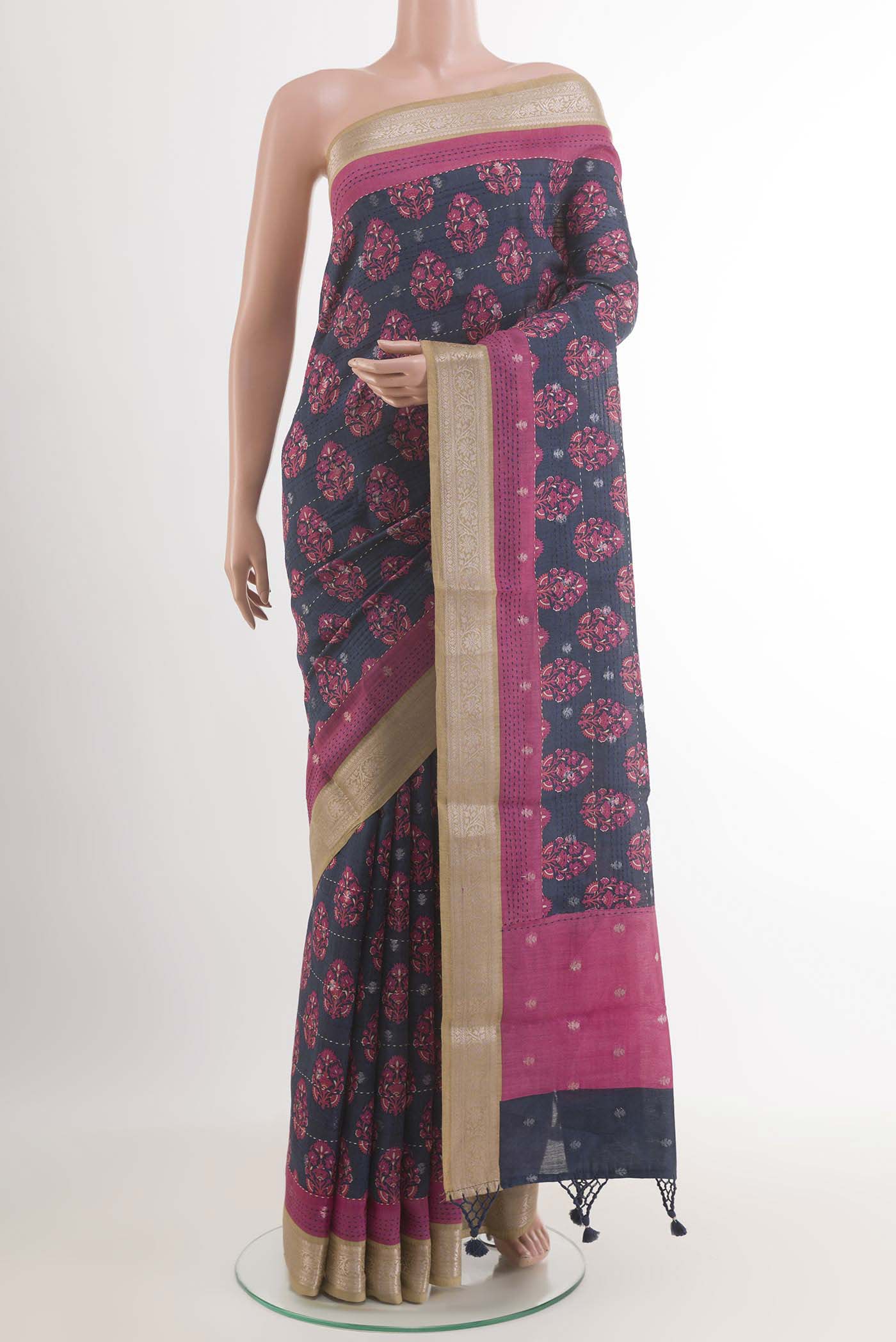 Blue Tussar Saree with Printed design on the body and Zari Border.  displayed on a mannequin