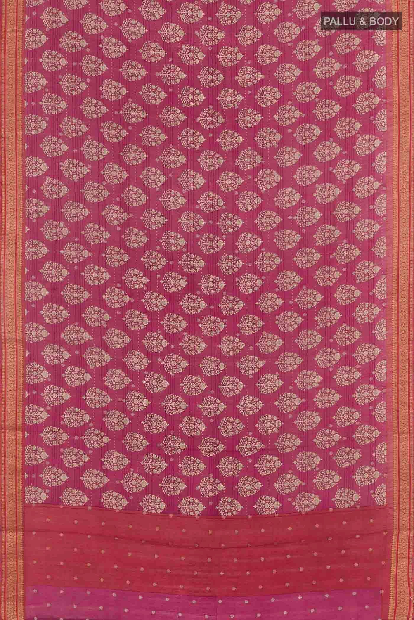 Flat view of Pink Tussar Saree with Printed design on the body and Zari Border. 