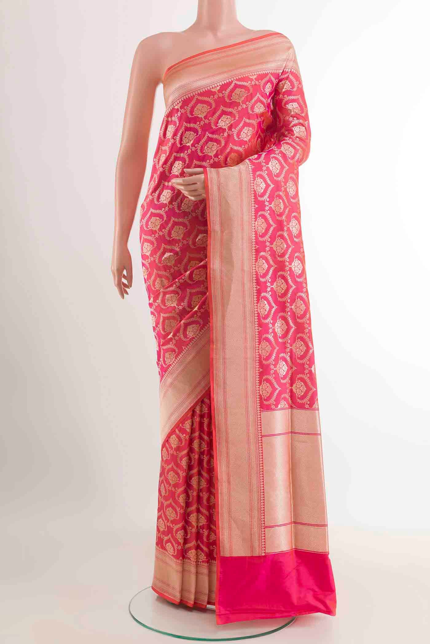 Rose pink Dual Tone Banarasi Silk Saree with Zari Brocade on the body and Zari Border displayed on a mannequin