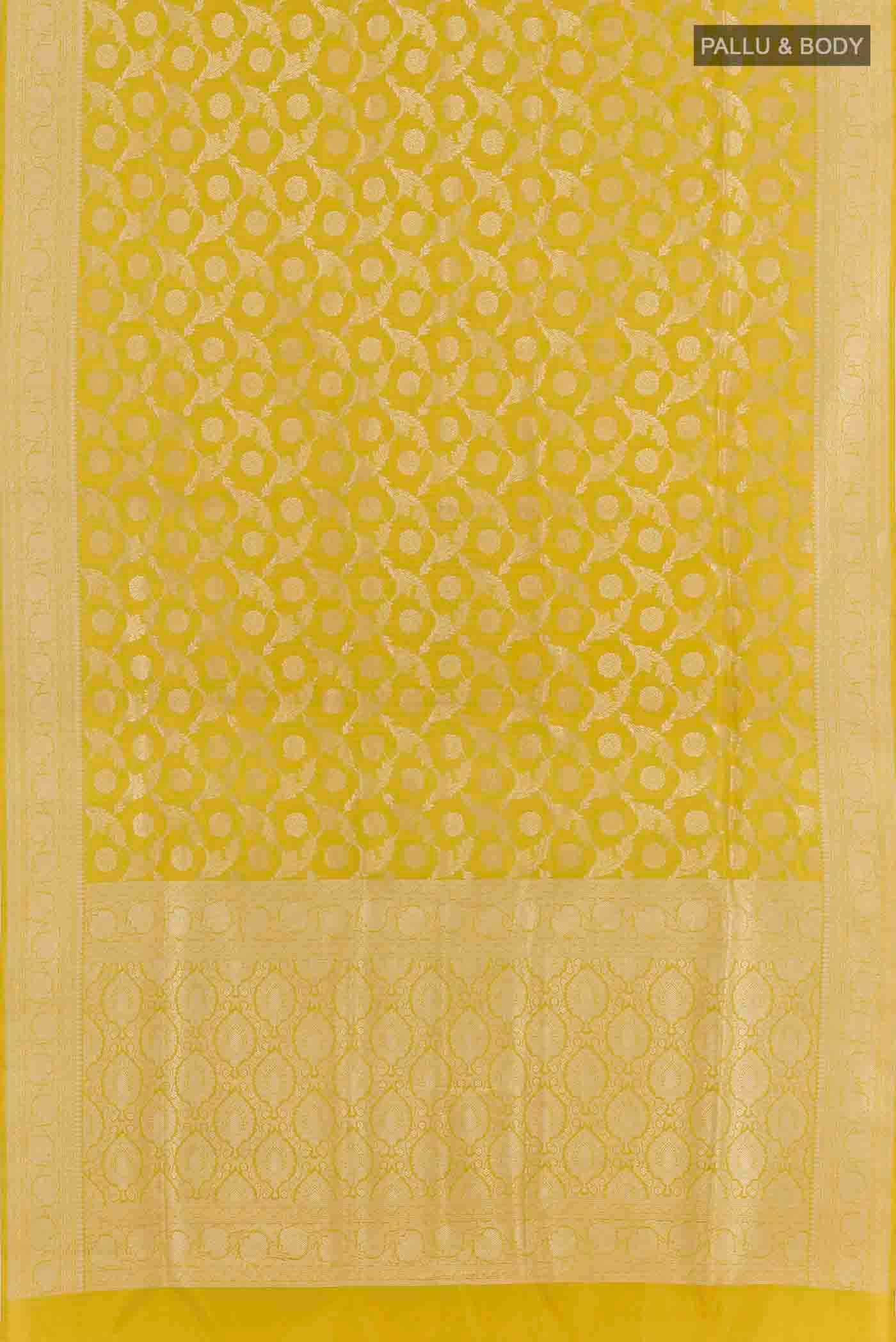 Flat view of Yellow Banarasi Silk Saree with Zari Brocade on the body and Zari Border. 