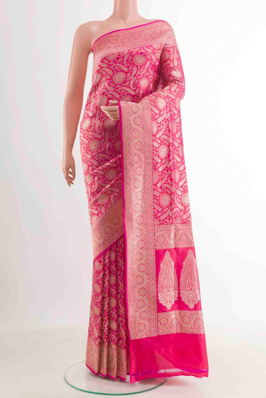 Pink Banarasi Silk Saree with Zari Brocade on the body and Zari Border.  displayed on a mannequin
