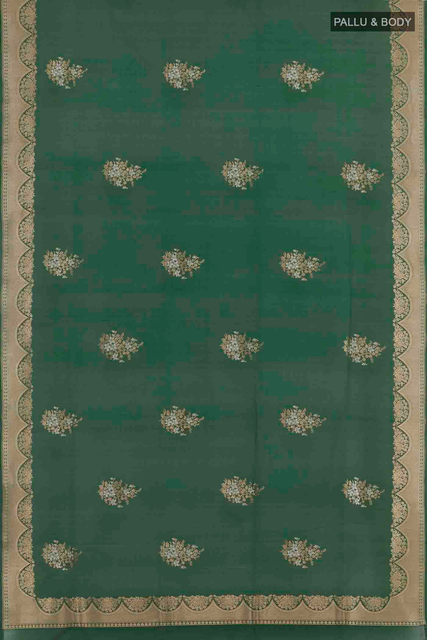 Flat view of Green Banarasi Silk Saree with Zari Butta on the body and Zari Border. 