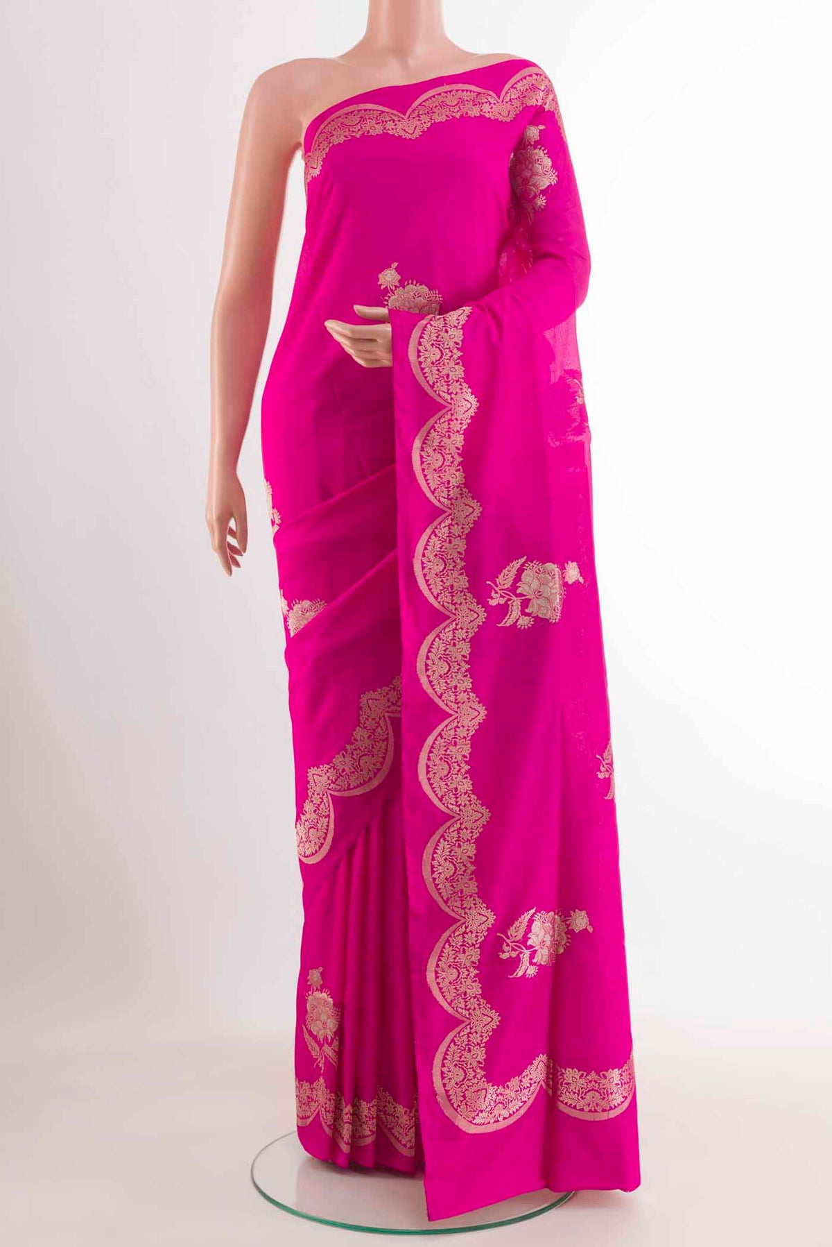 Pink Banarasi Silk Saree with Zari Butta on the body and Zari Border.  displayed on a mannequin