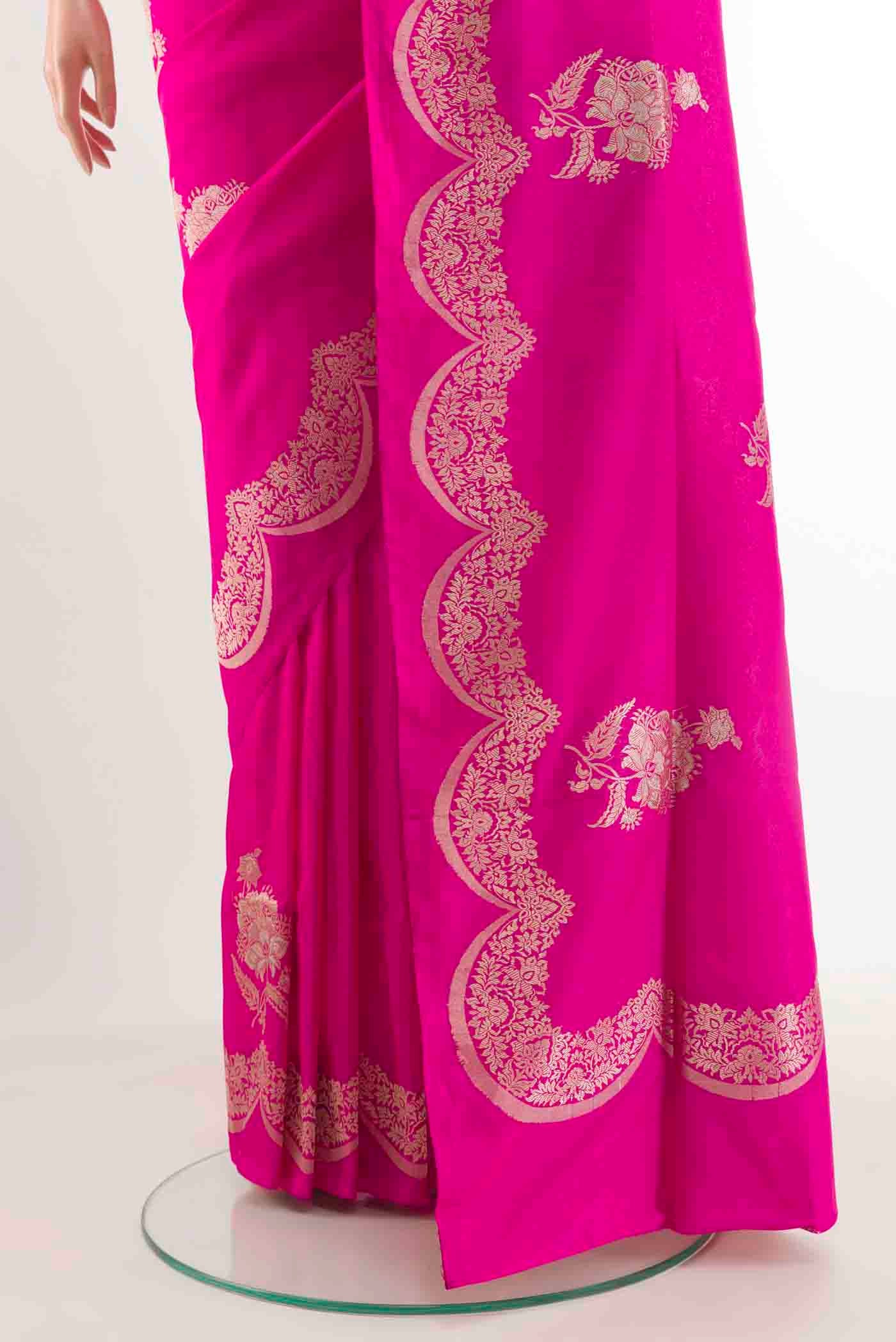 Pleats and pallu of Pink Banarasi Silk Saree with Zari Butta on the body and Zari Border. 