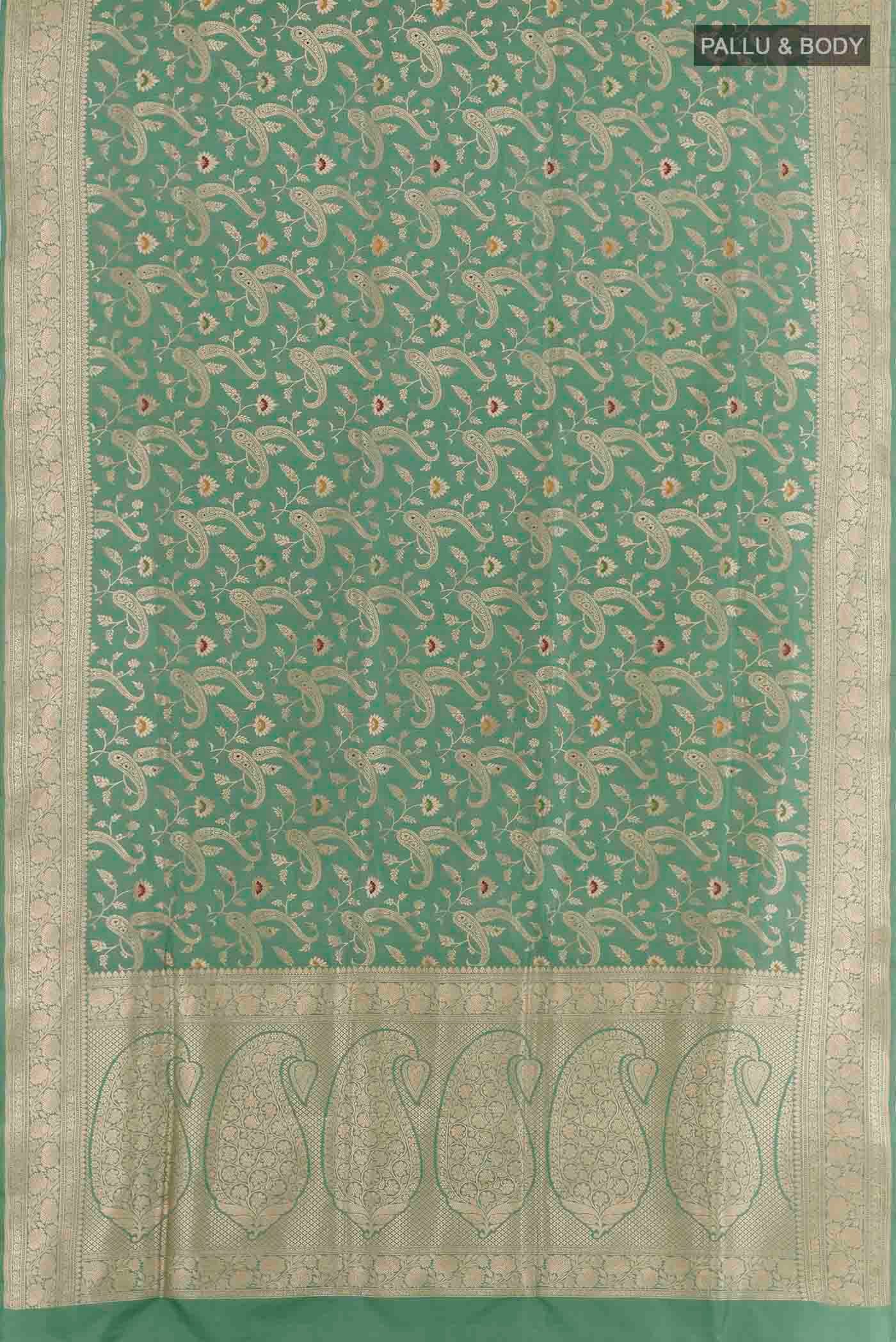 Flat view of Sage Green Banarasi Silk Saree with Zari Brocade on the body and Zari Border. 