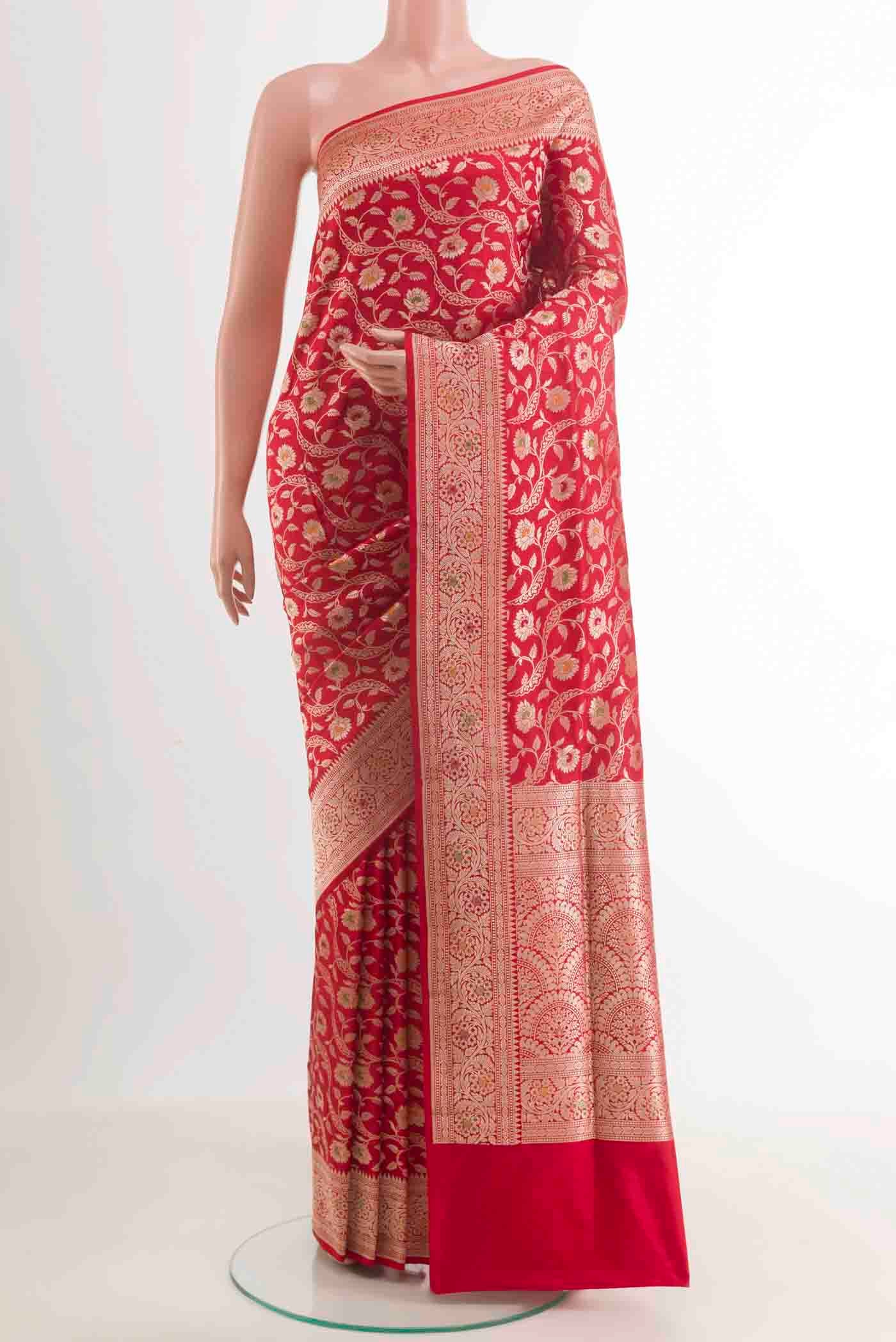 Red Banarasi Silk Saree with Zari Brocade on the body and Zari Border.  displayed on a mannequin