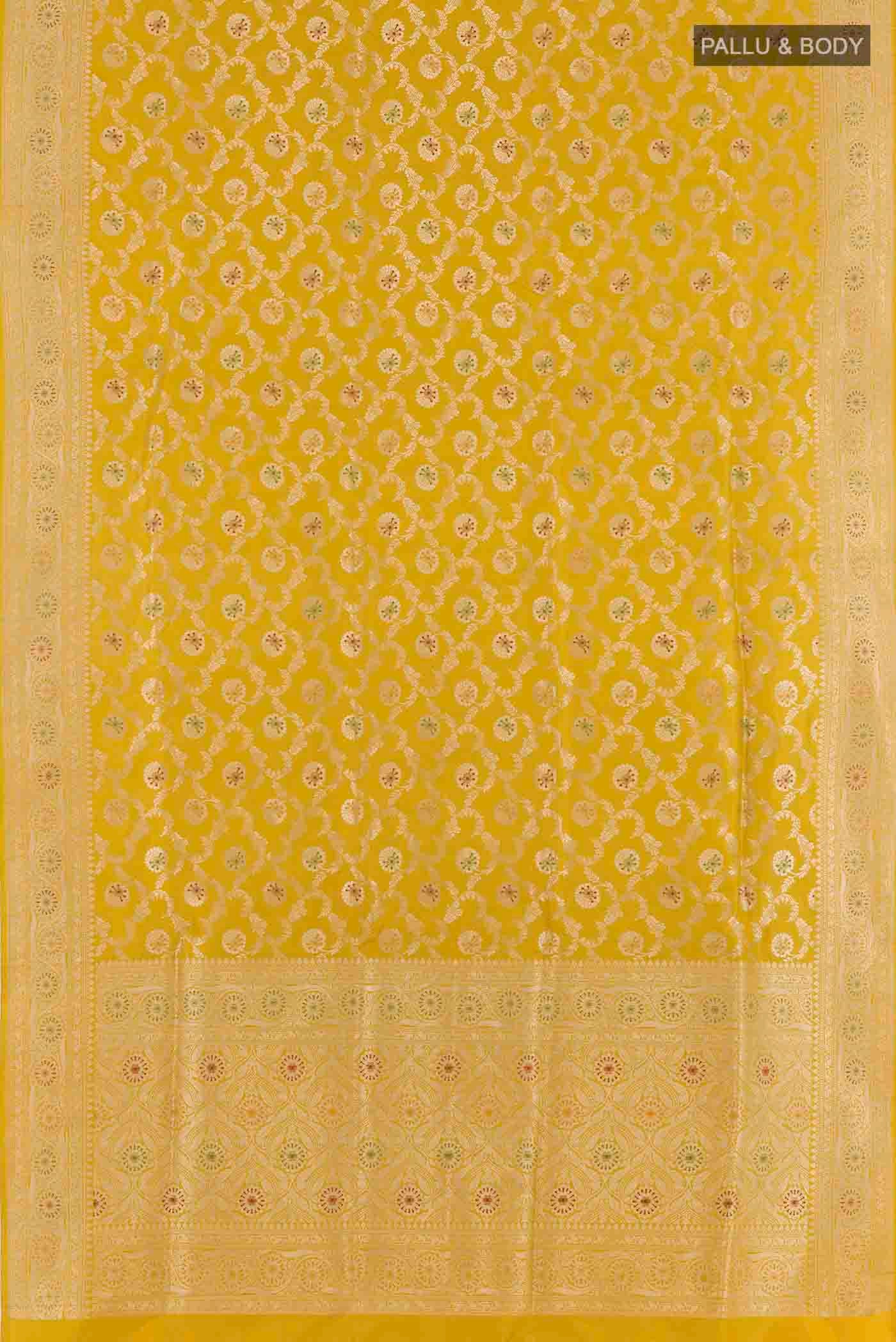 Flat view of Yellow Banarasi Silk Saree with Zari Butta on the body and Zari Border