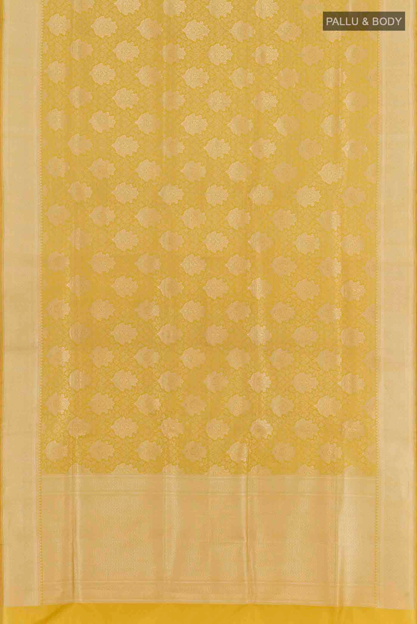 Flat view of Yellow Banarasi Silk Saree with Zari Brocade on the body and Zari Border. 