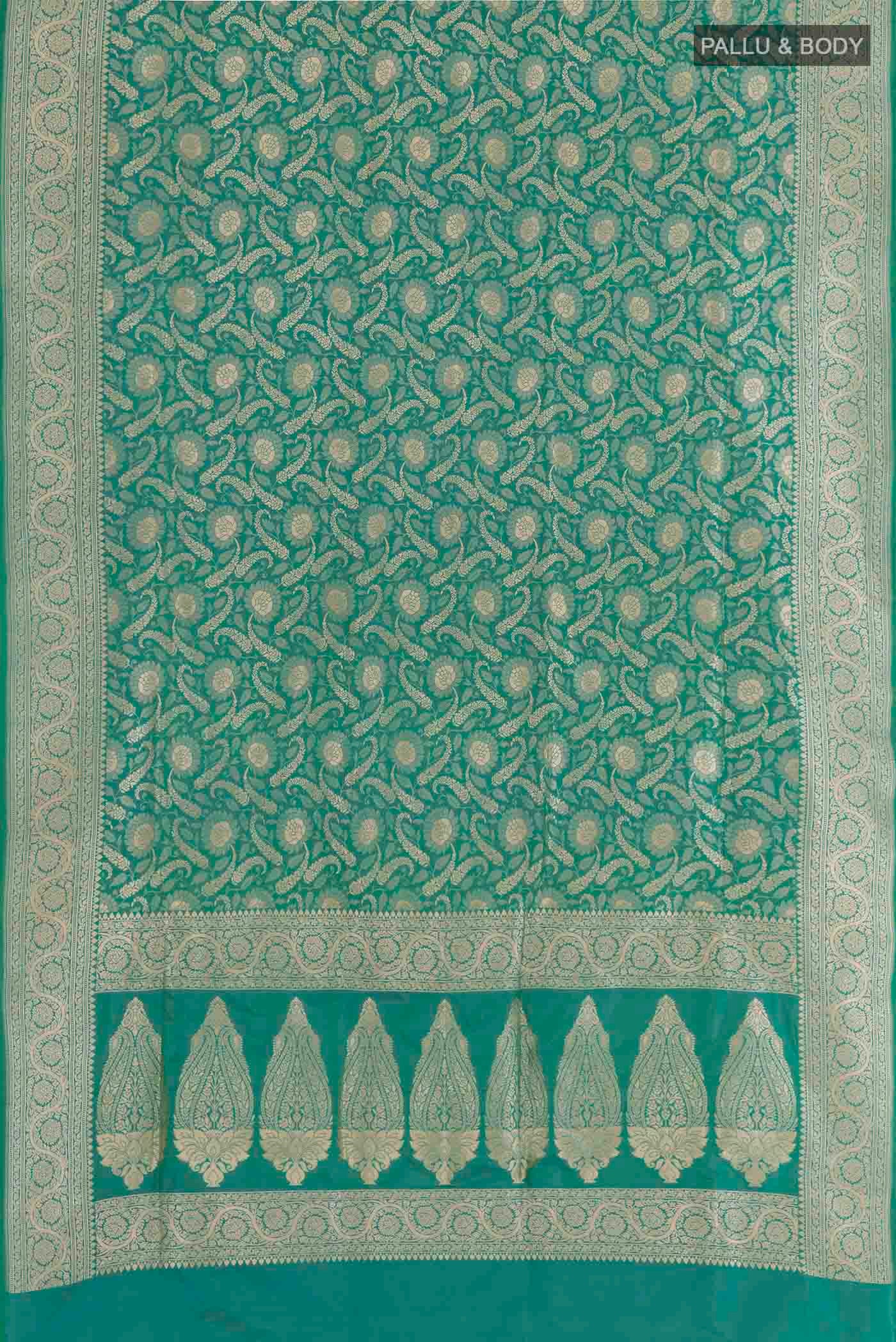 Flat view of Sea Green Banarasi Silk Saree with Zari Brocade on the body and Zari Border. 