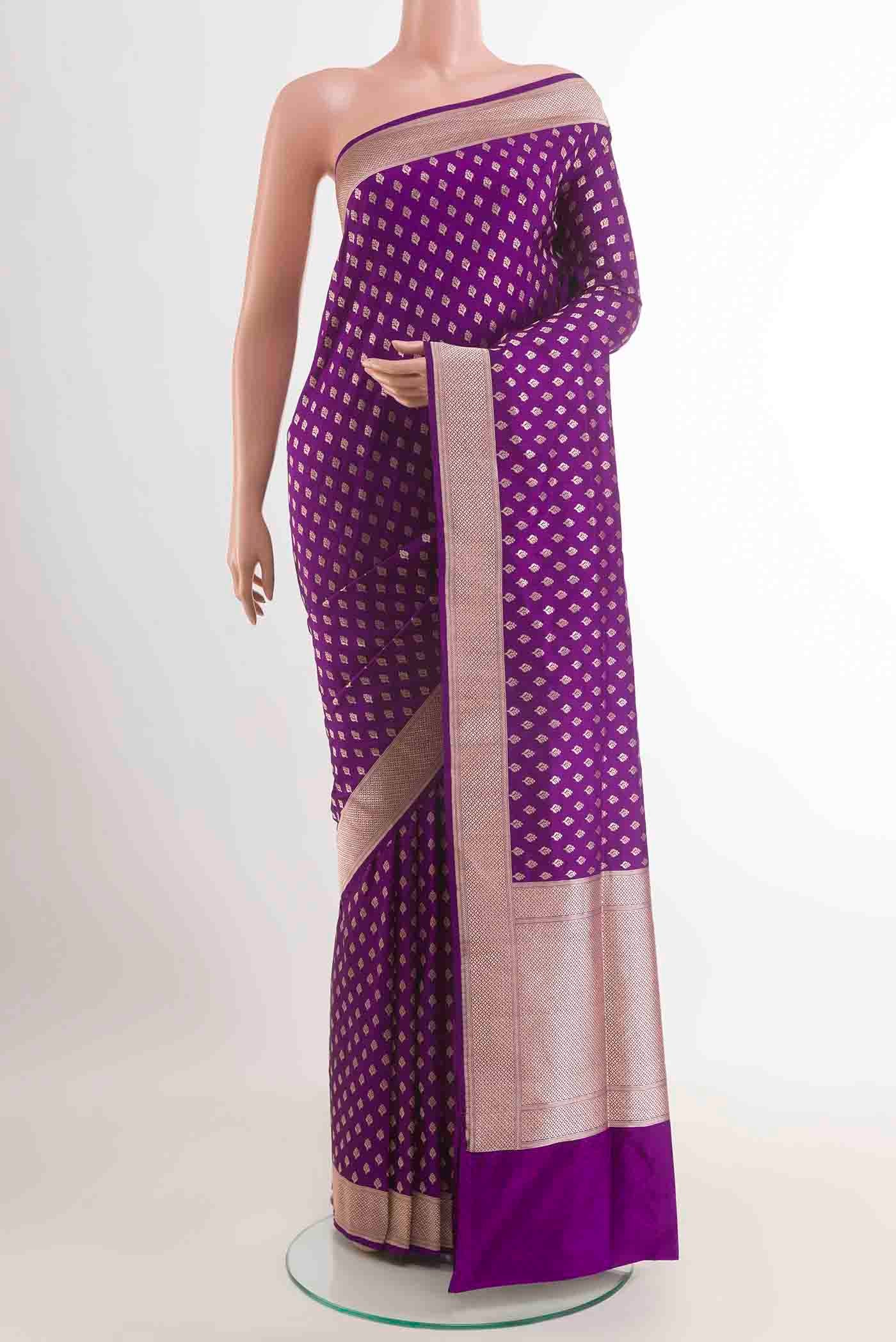 Purple Banarasi Silk Saree with Zari Butta on the body and Zari Border displayed on a mannequin