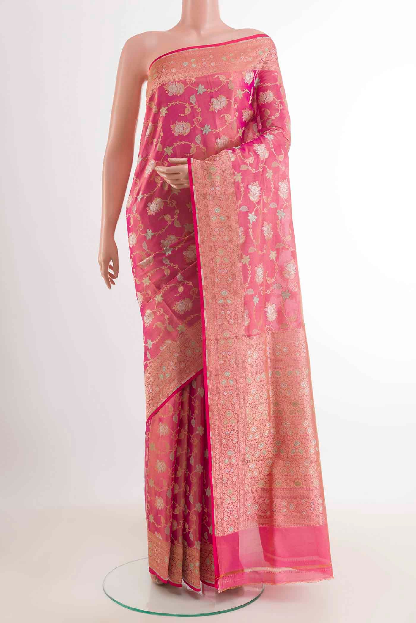 Pink Banarasi Silk Saree with Zari Brocade on the body and Zari Border displayed on a mannequin