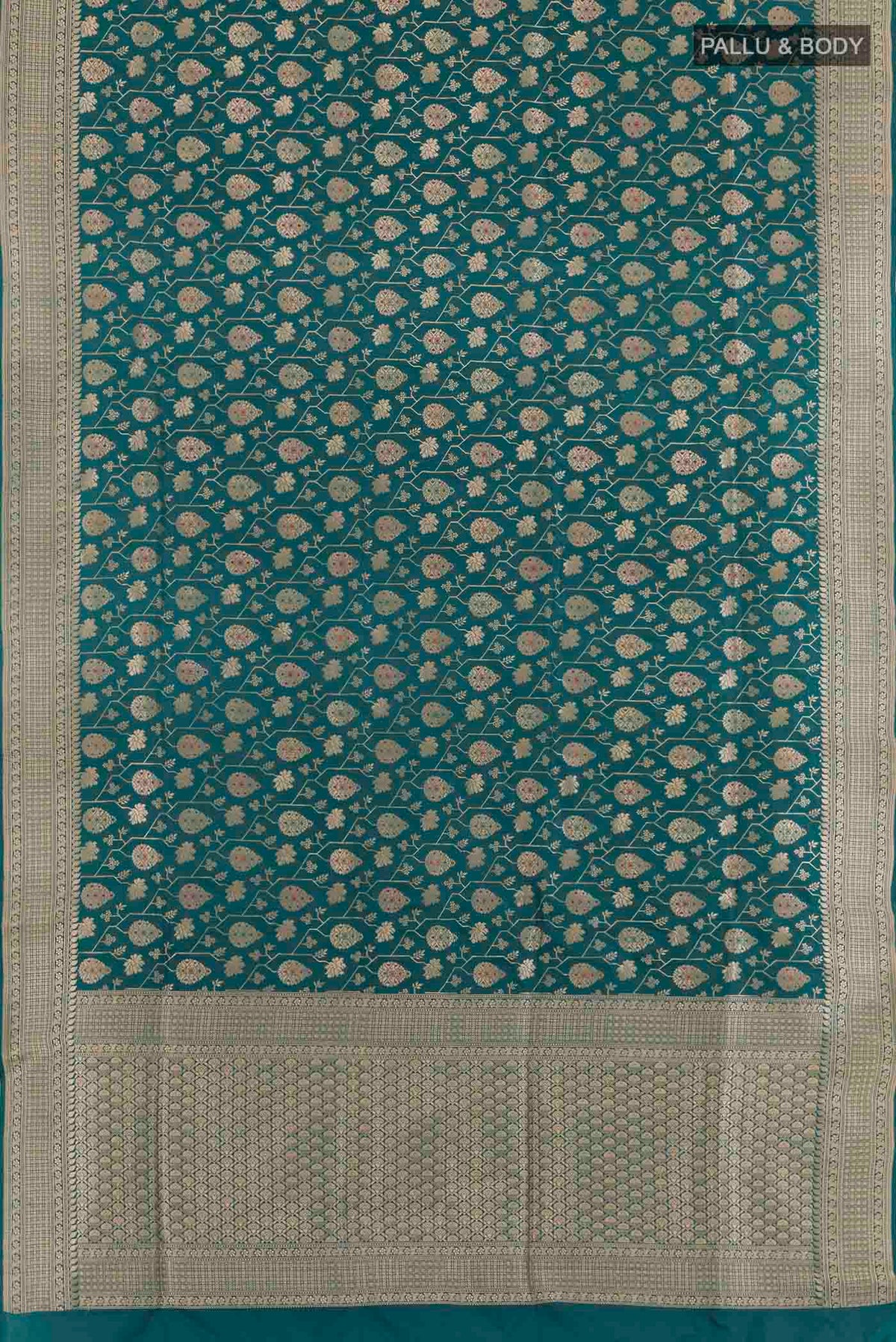 Flat view of Teal Banarasi Silk Saree with Zari Brocade on the body and Zari Border. 