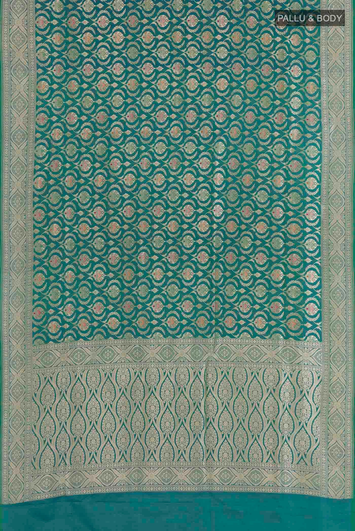 Flat view of Sea Green Banarasi Silk Saree with Zari Brocade on the body and Zari Border. 