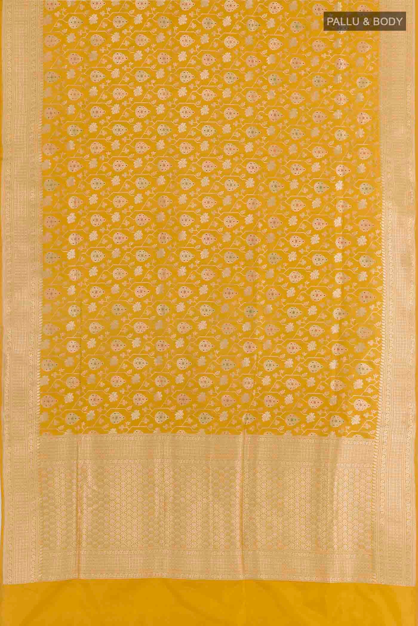 Flat view of Yellow Banarasi Silk Saree with Zari Brocade on the body and Zari Border. 